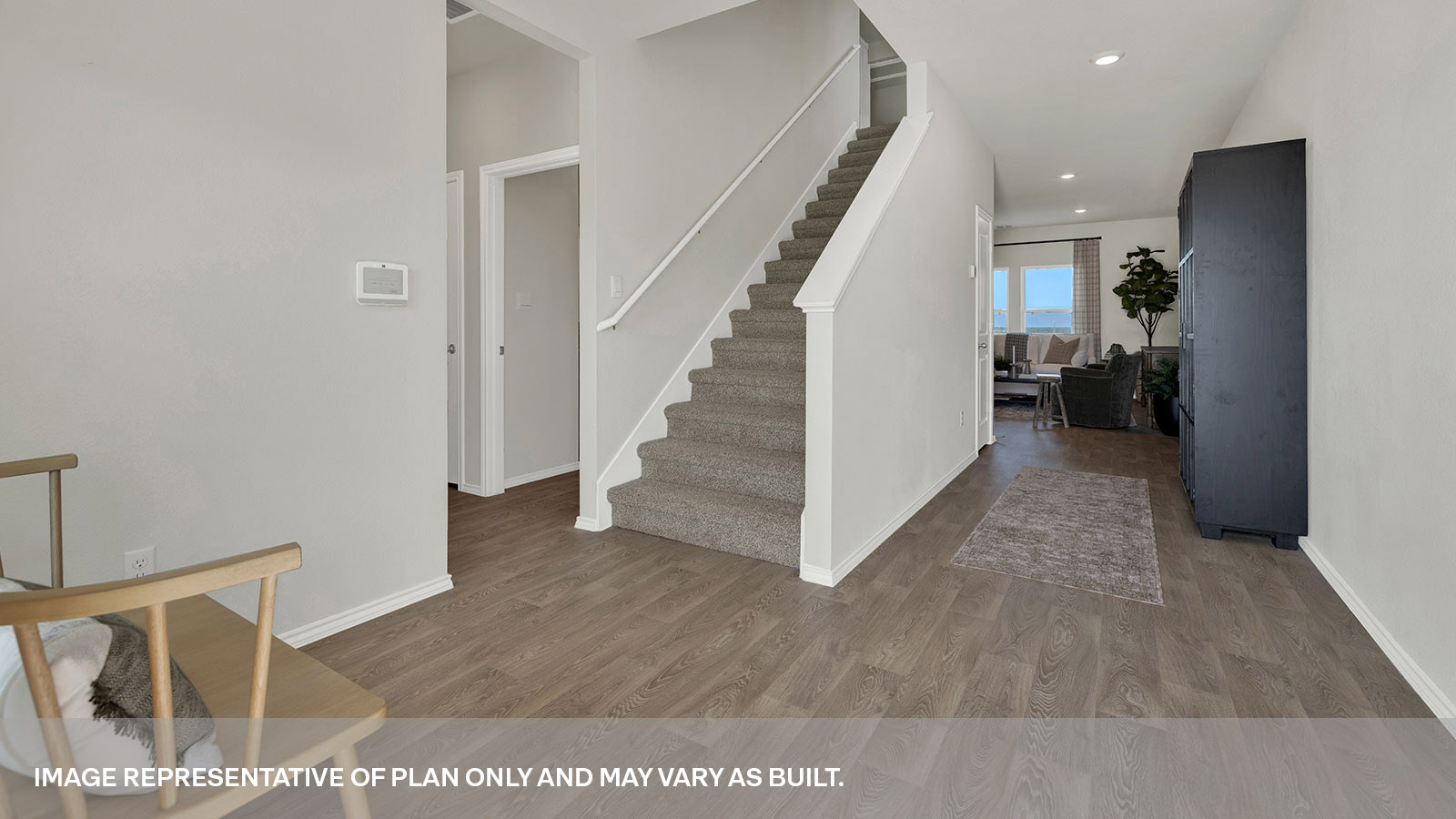 Entry hallway with stairs leading to the gameroom.