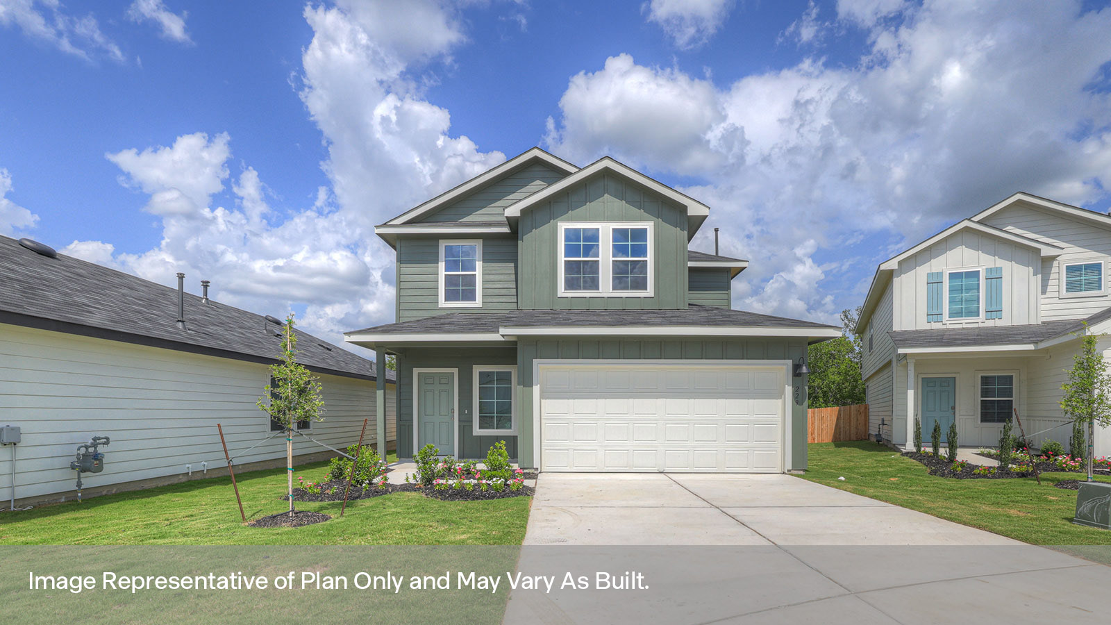 Two-story farmhouse exterior with 2 car garage.