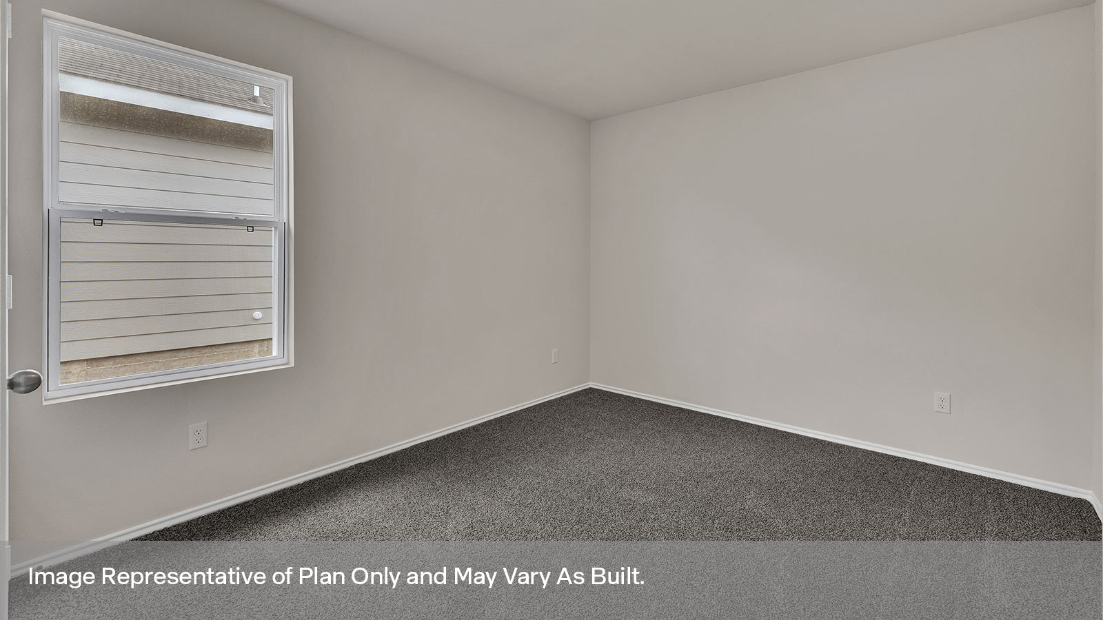Bedroom with carpeting and one window.