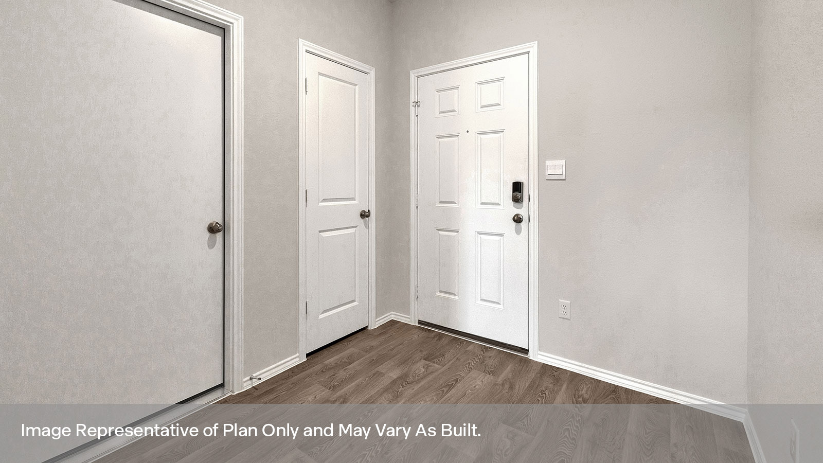 Entry hallway with vinyl flooring and front door.