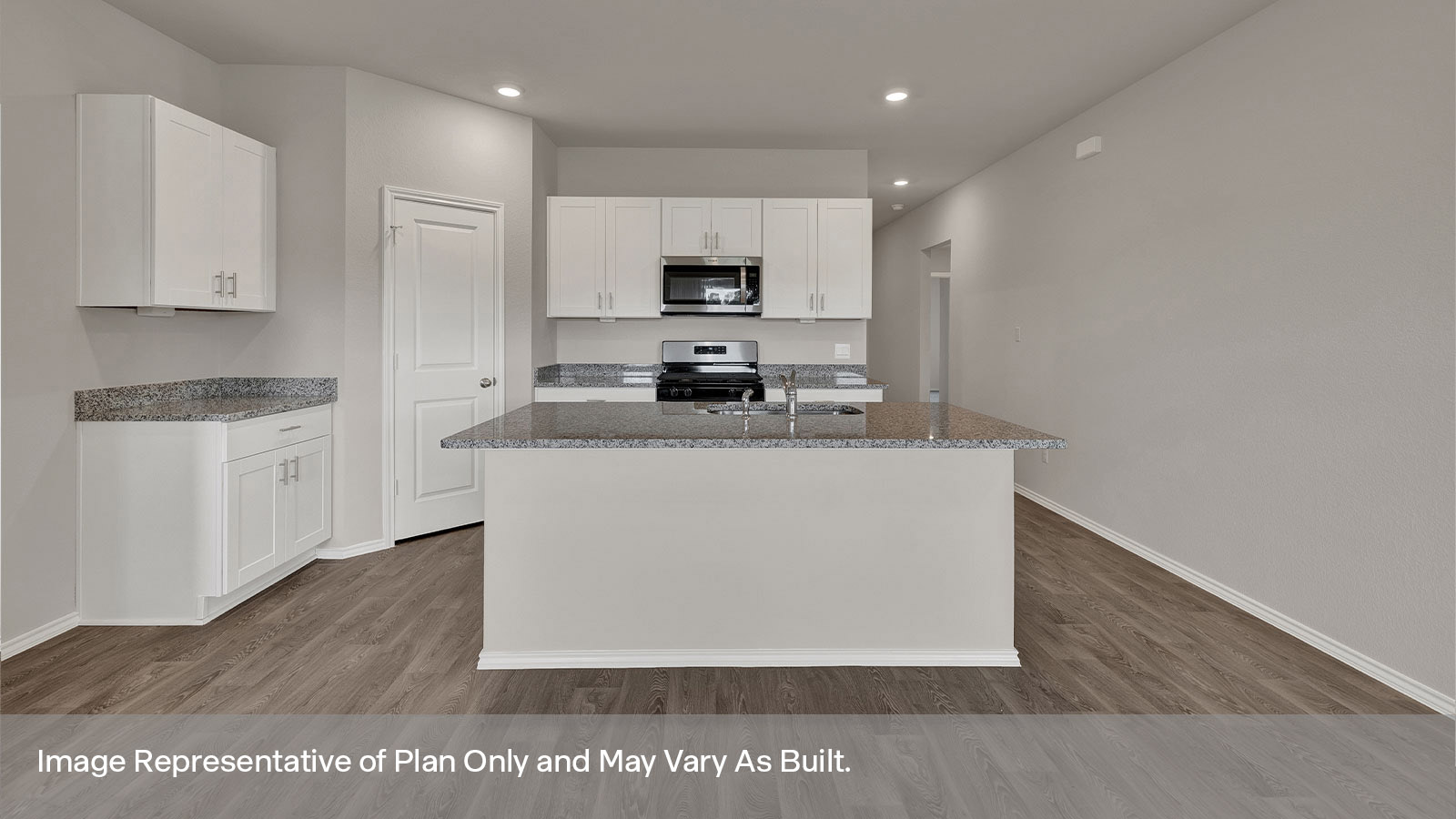 Kitchen with granite countertops and kitchen sink.