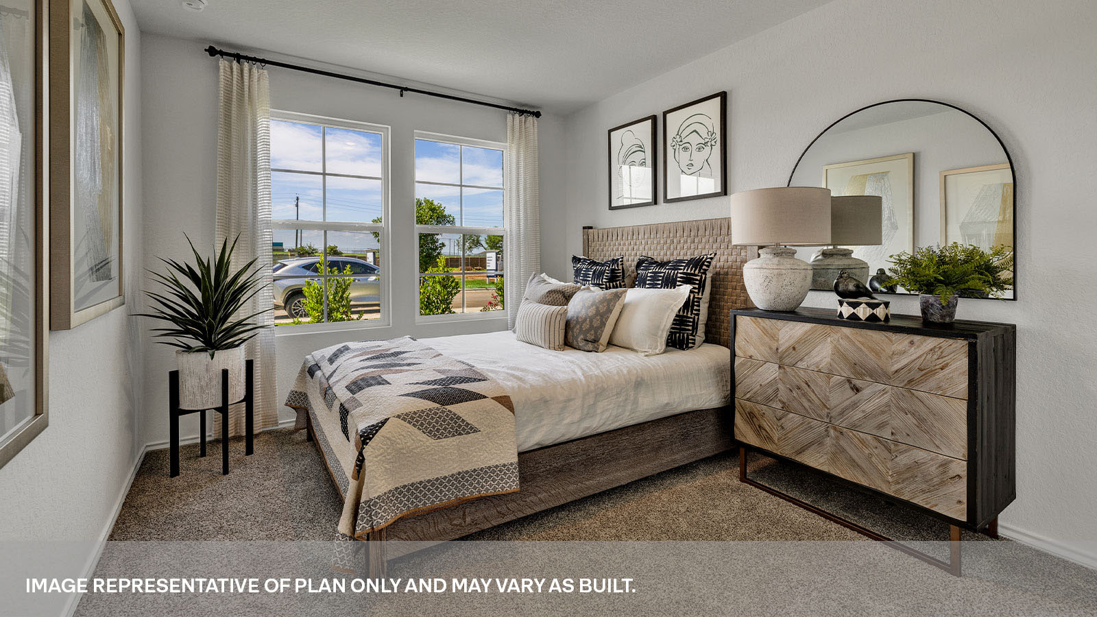 Bedroom with carpeting and one window.