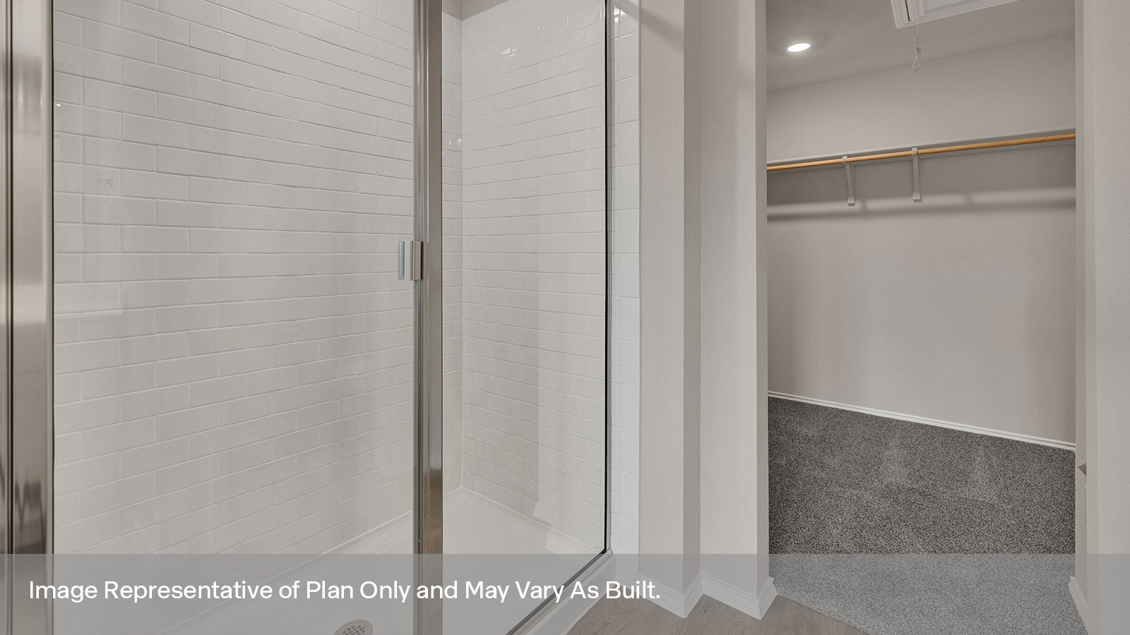 Main bathroom with walk-in shower and wooden shelving.