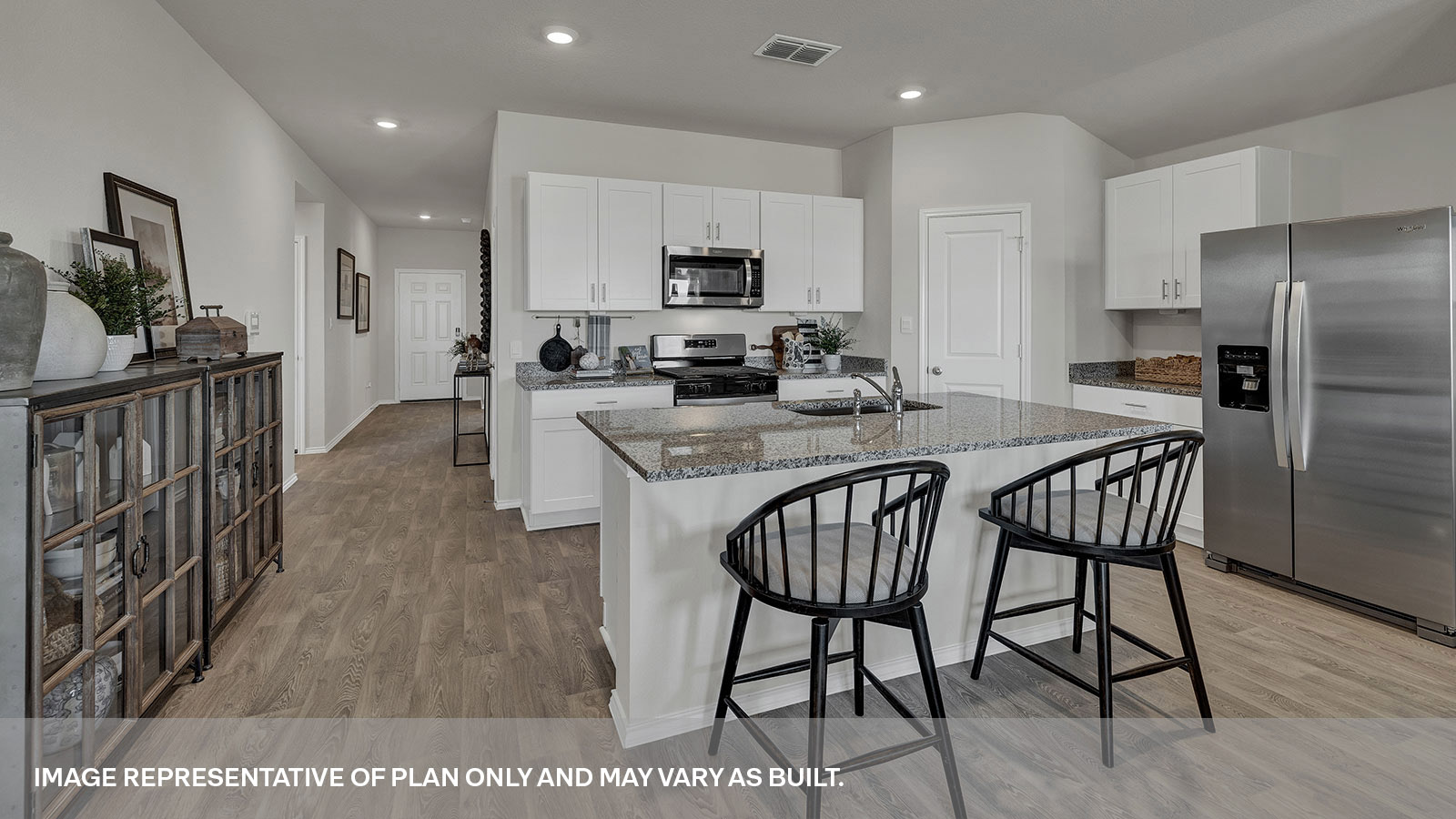 Kitchen island overlooking the dining room and living room.