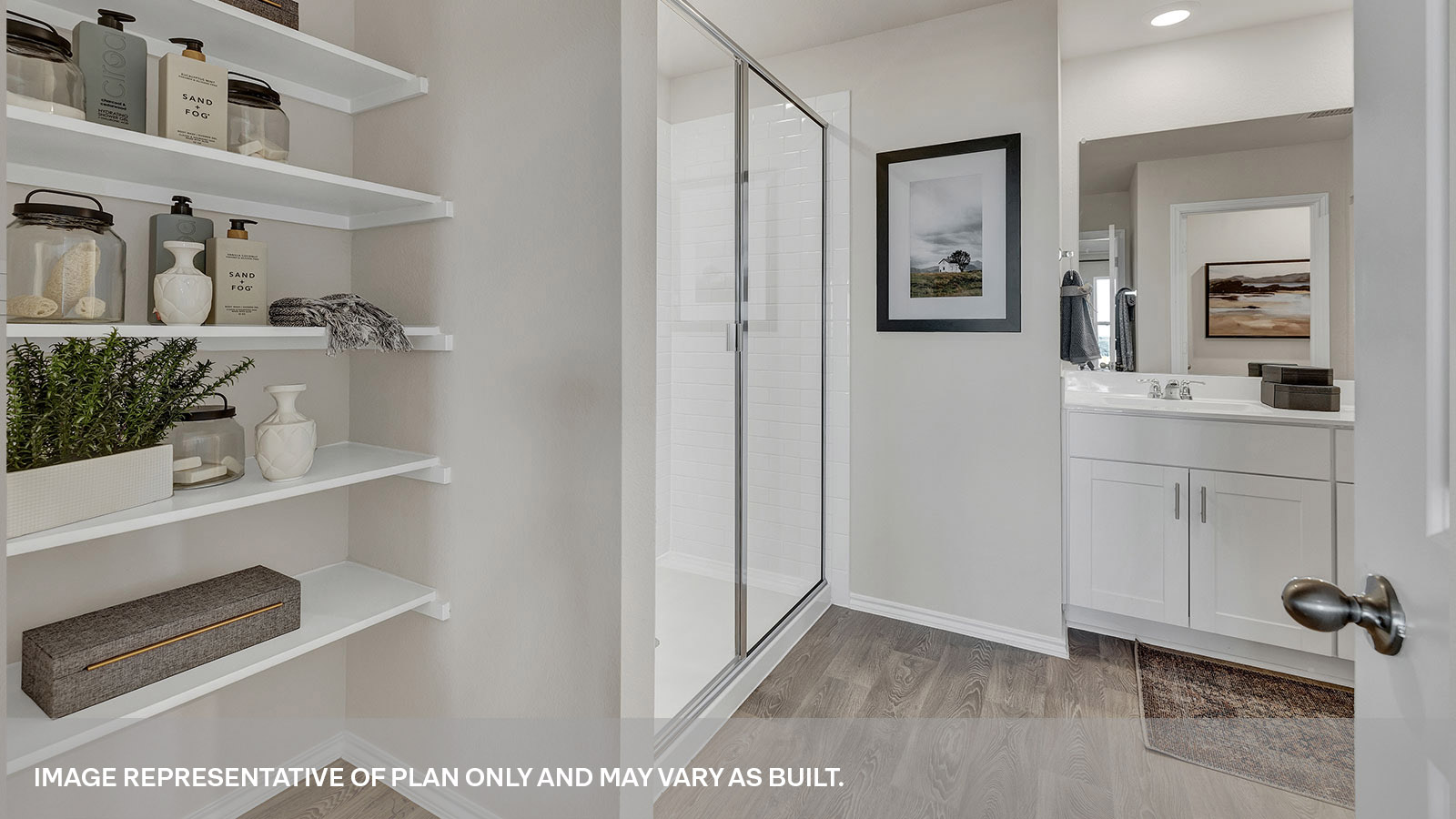 Main bathroom with large walk-in shower and double sink vanity.