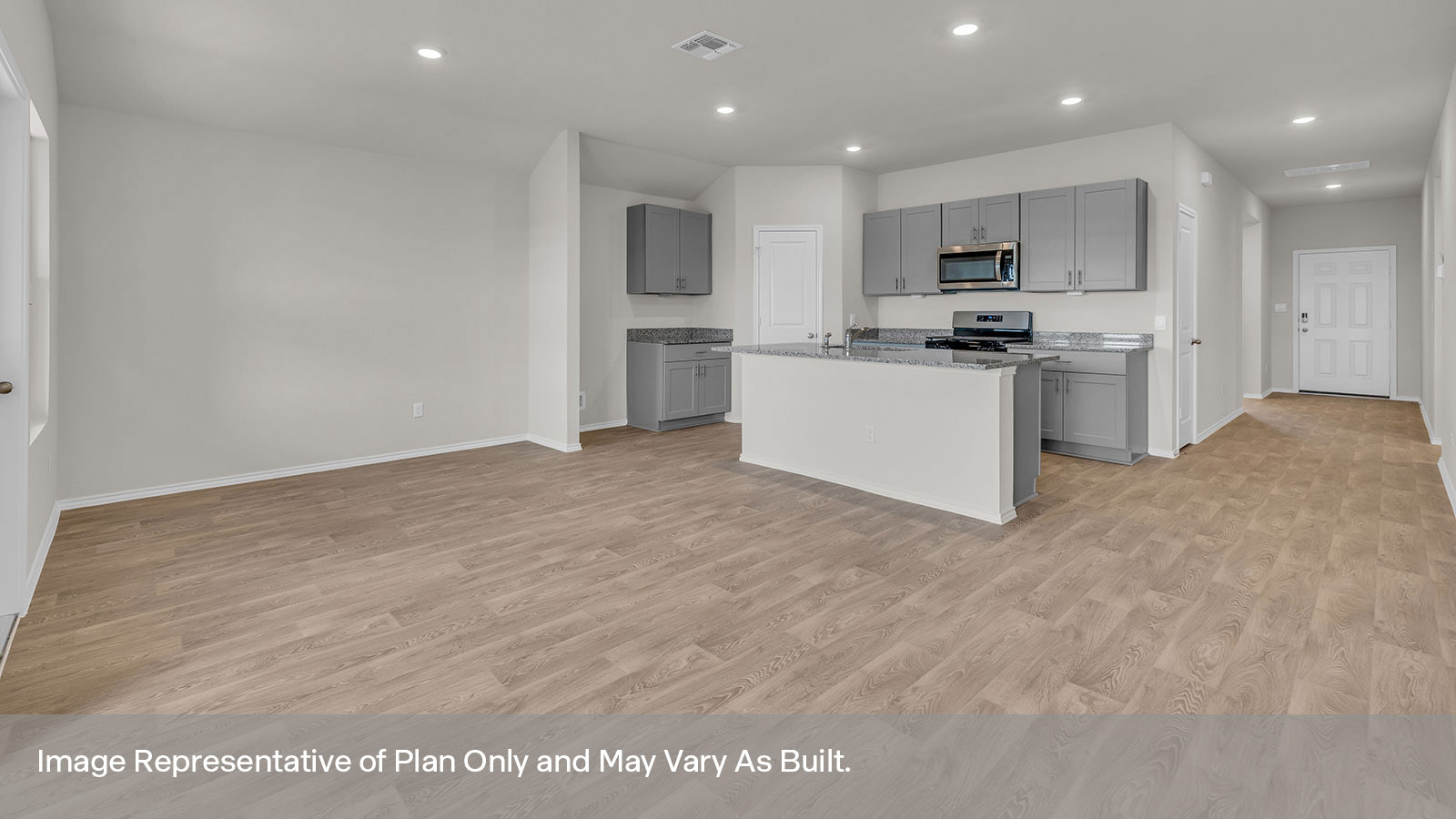 Kitchen island and large sink looking into the living room and dining area.