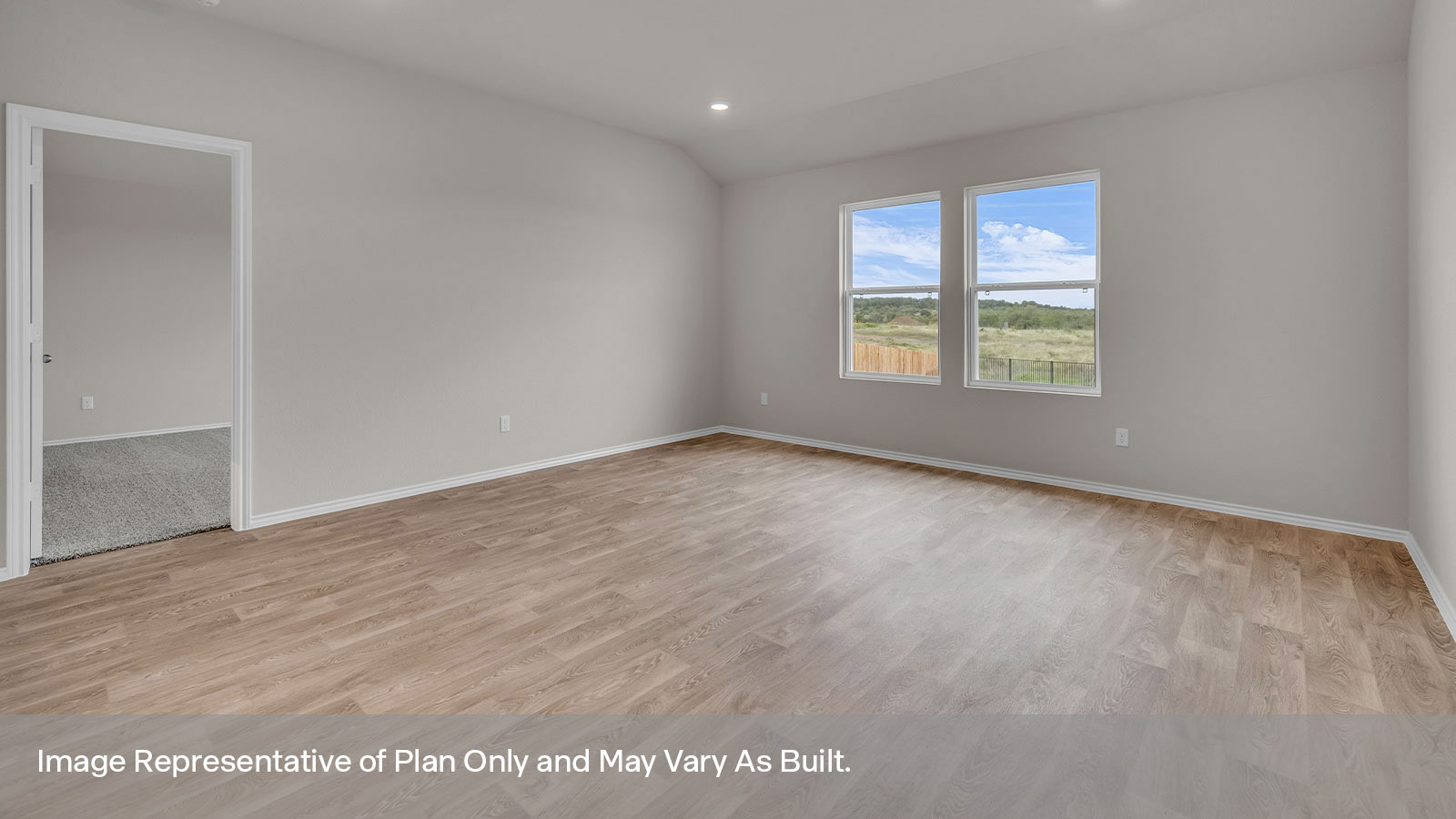 Living room and entrance to the main bedroom.