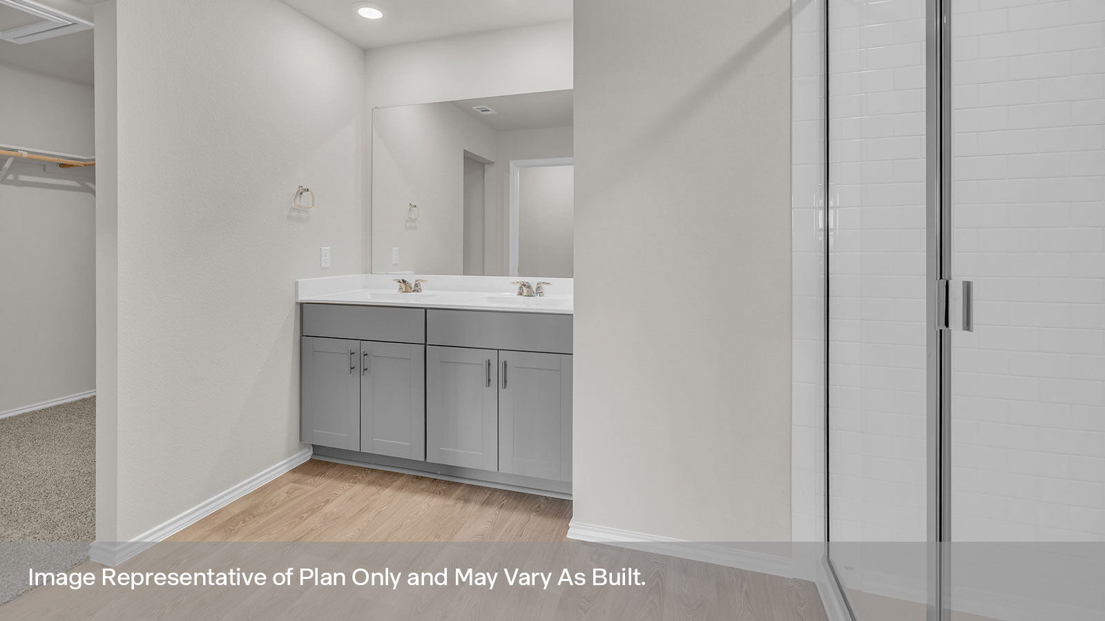 Main bathroom with walk-in shower, shelves and vanity.