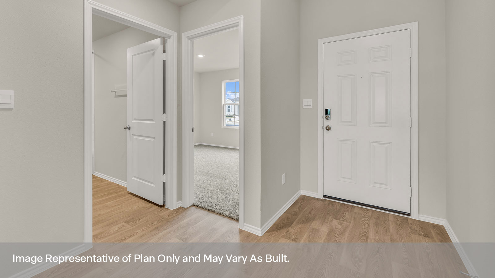 Entry hallway with front door and foyer