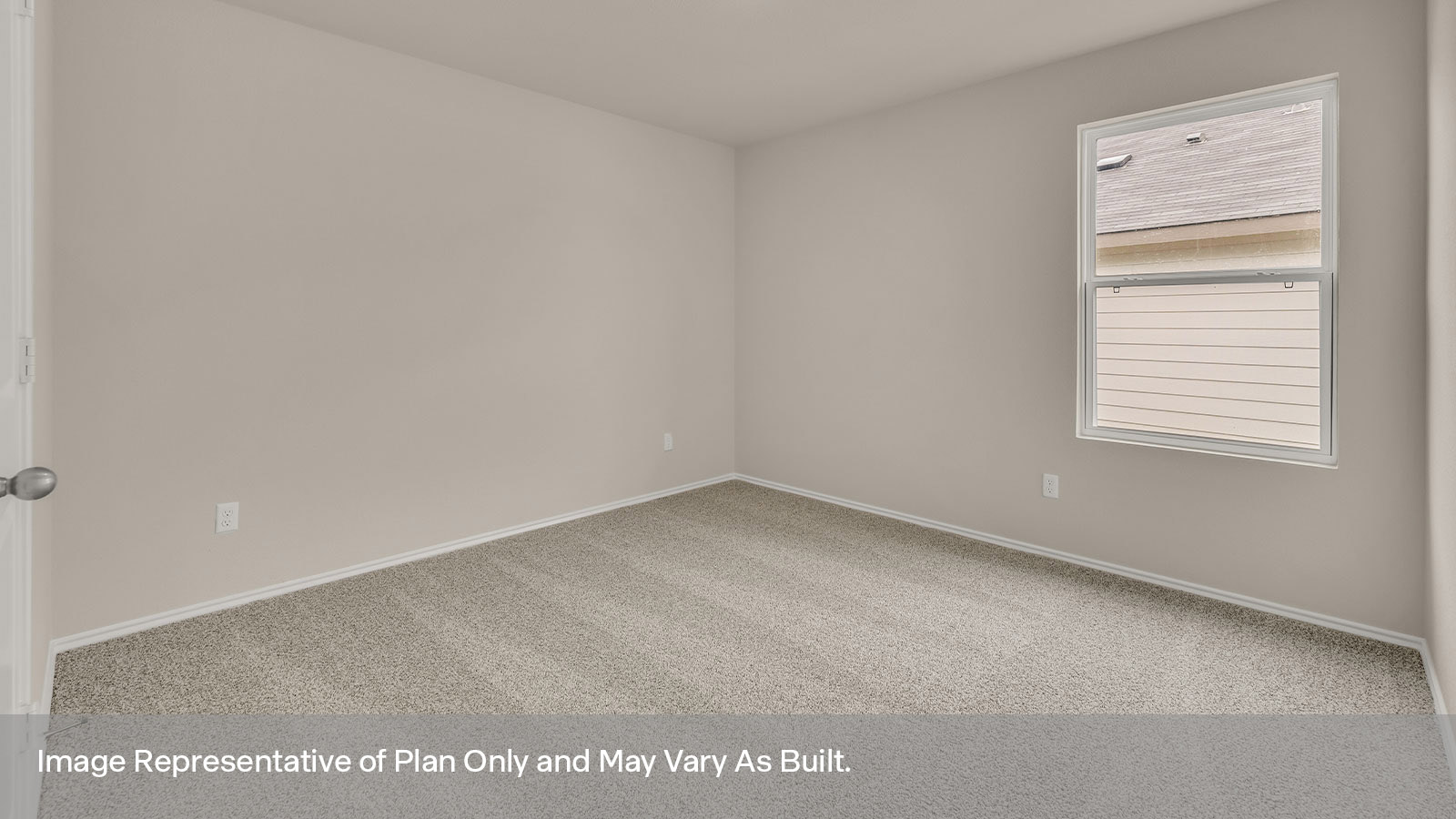 Second bedroom with carpeting and a window showing the side yard.