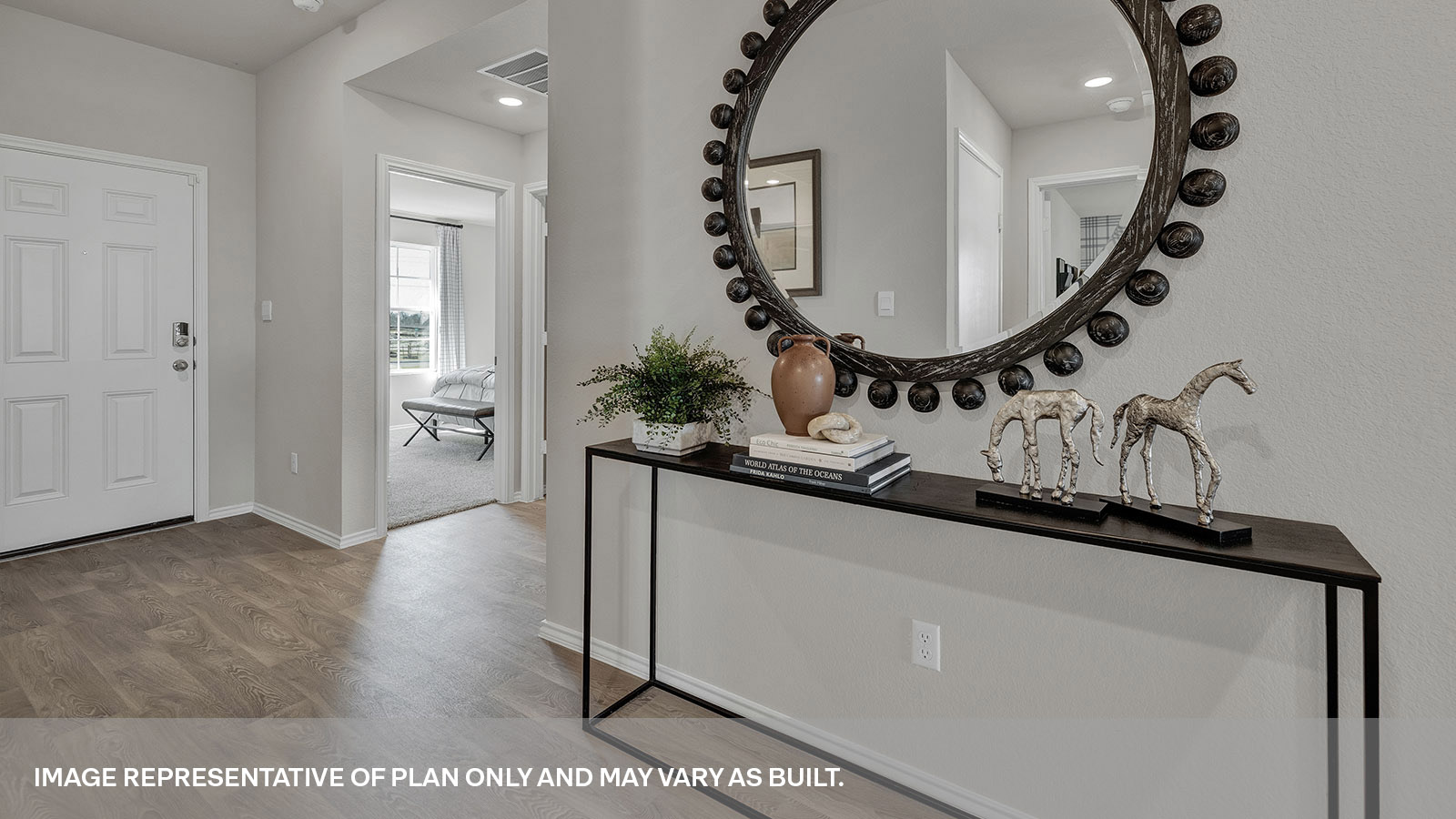 Entry hallway with front door and foyer