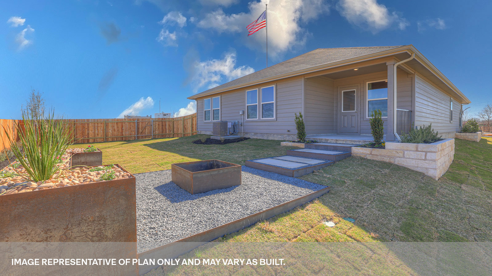 Covered back patio with privacy fence.