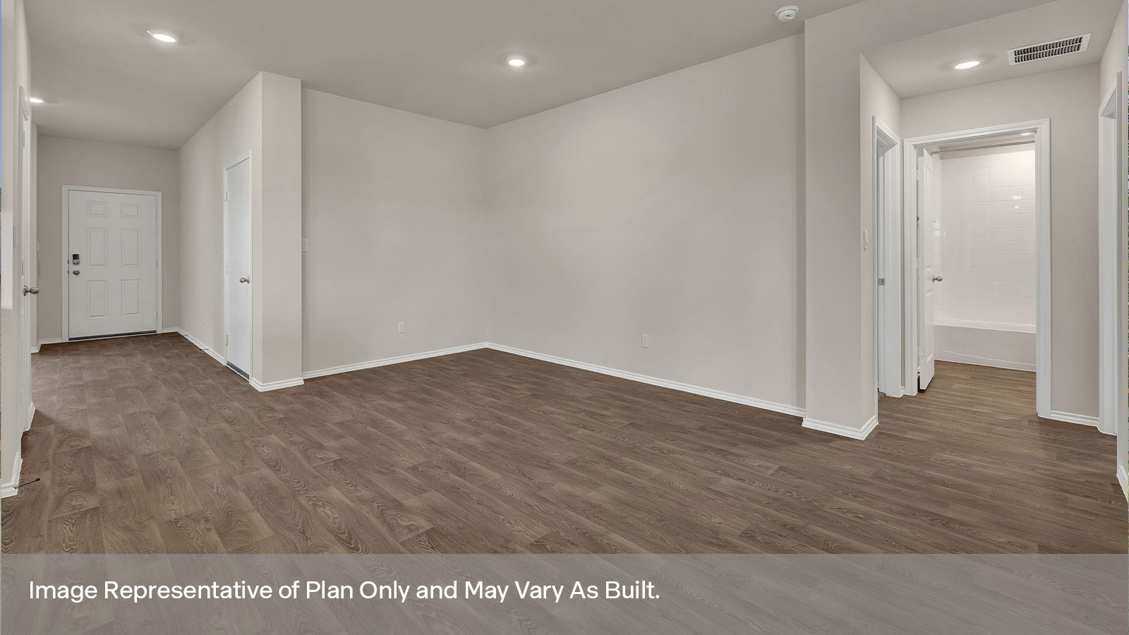 Entry hallway with vinyl flooring and front door.