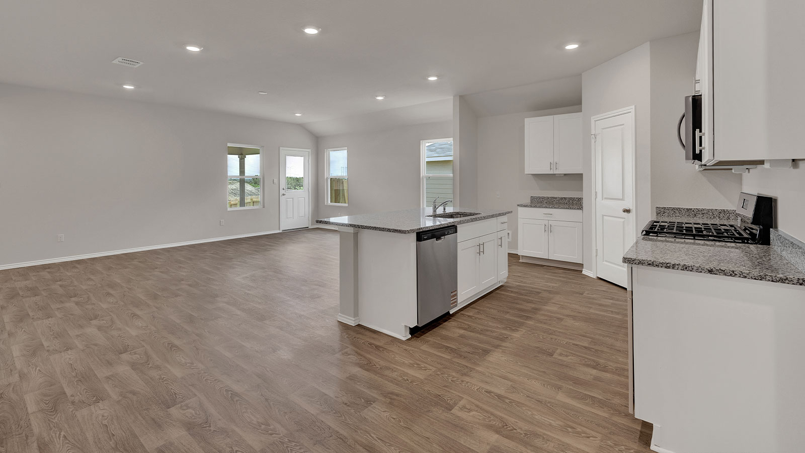 Kitchen opening to the living room.