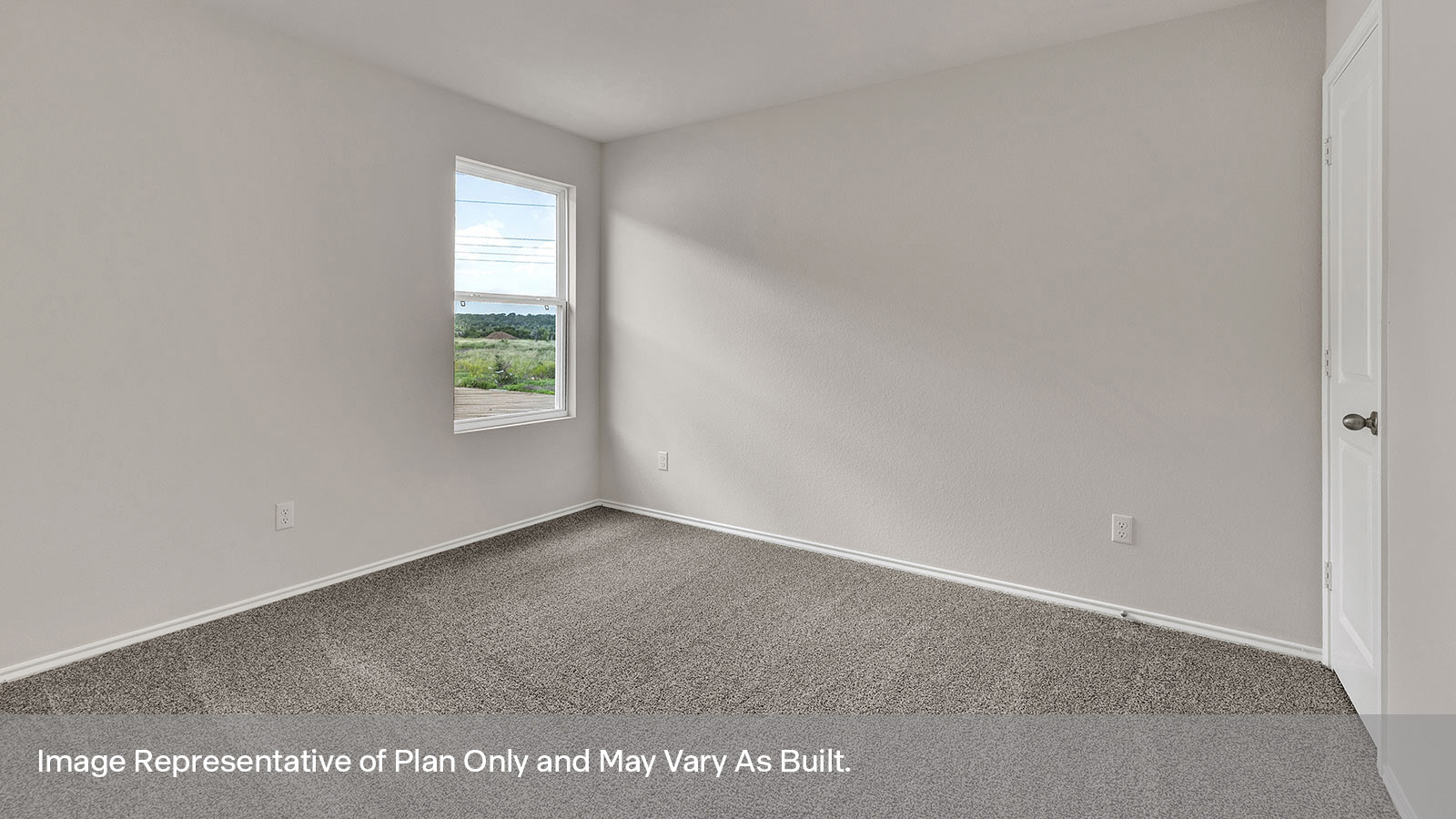 Front bedroom with carpeting and two windows.