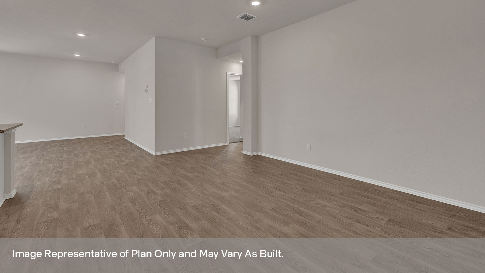 Dining room with vinyl flooring and entry hallway.Dining room with vinyl flooring and entry hallway.