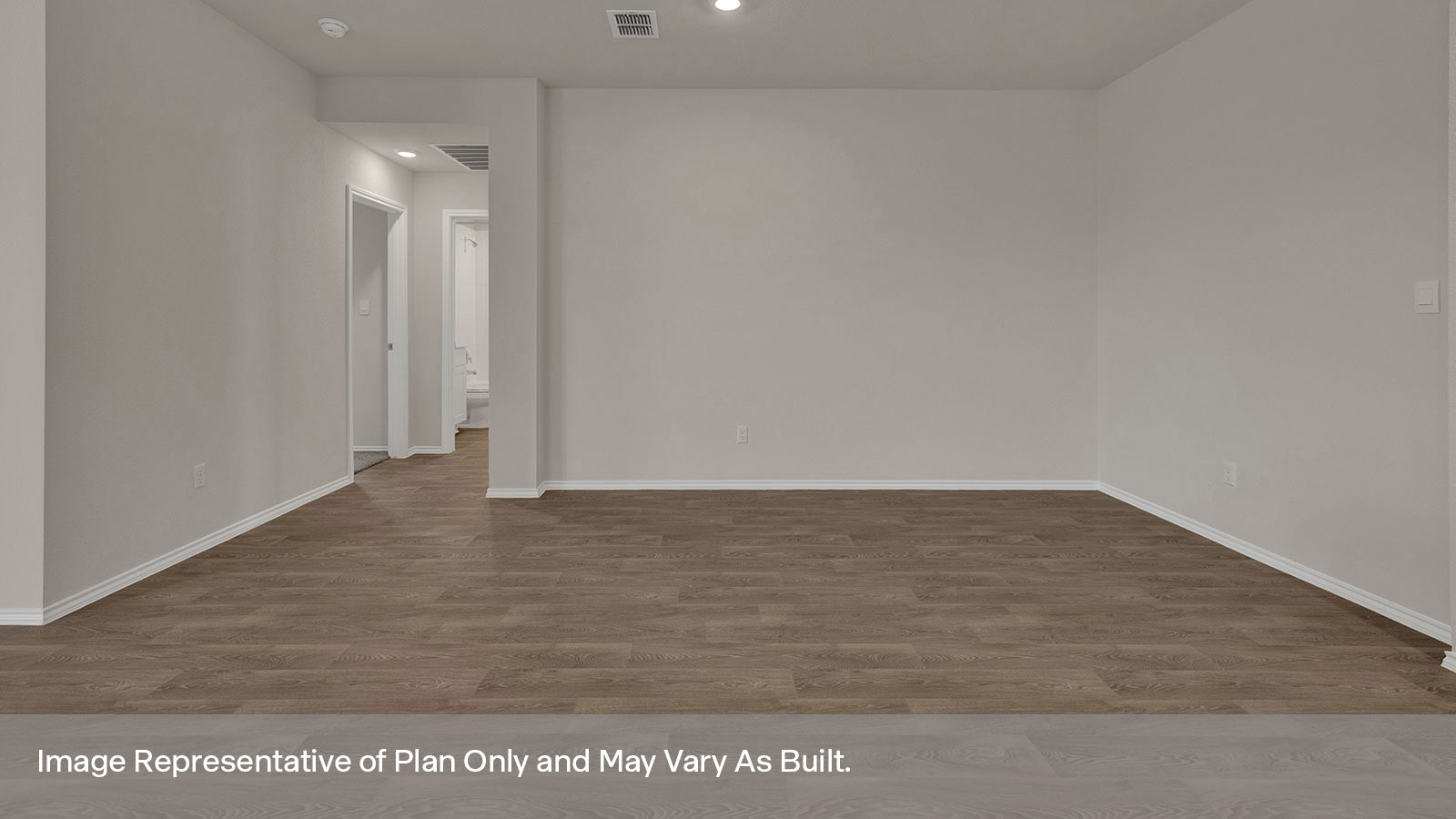 Dining room with vinyl flooring and entry hallway.