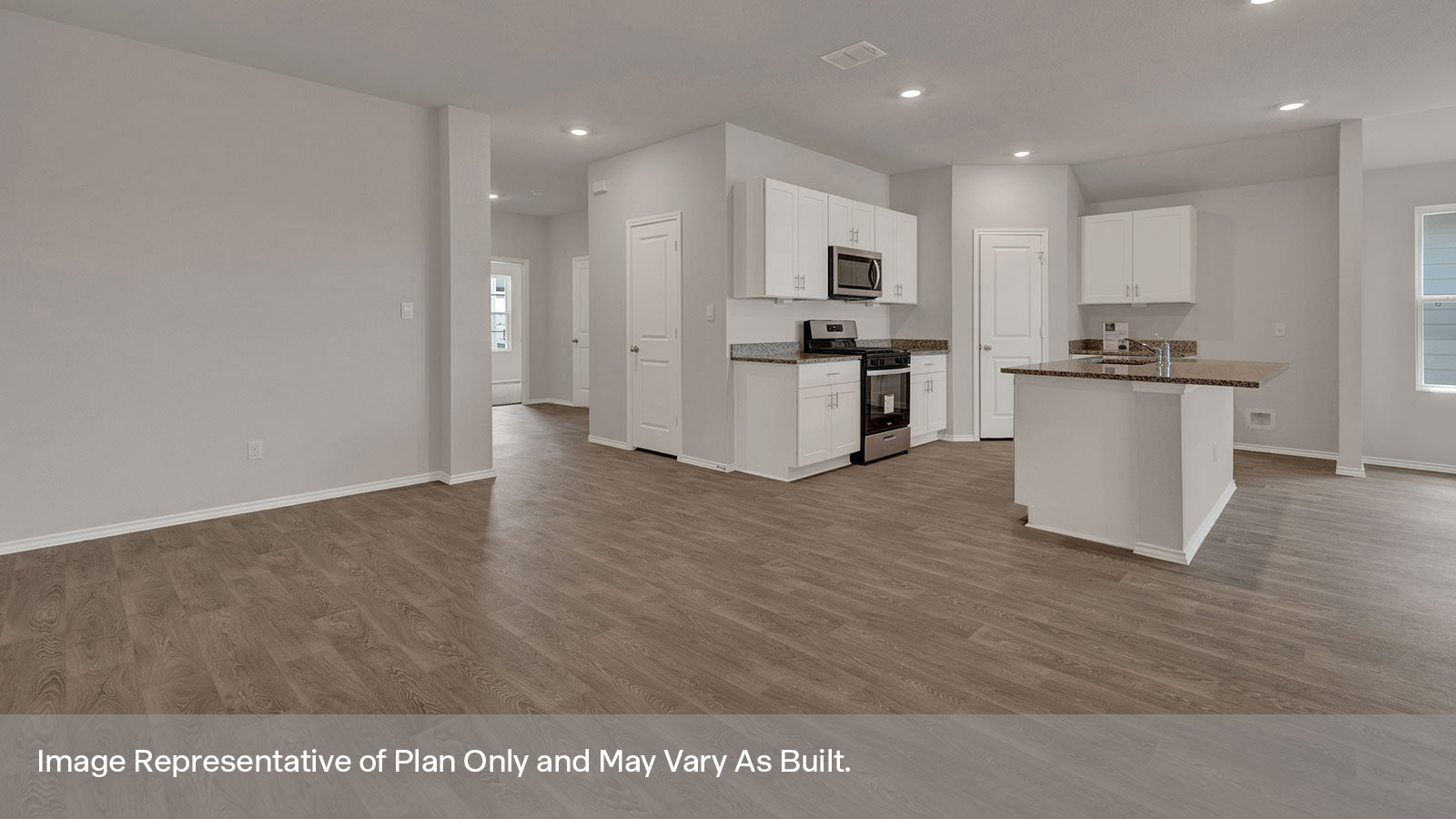 Dining room with vinyl flooring and entry hallway.