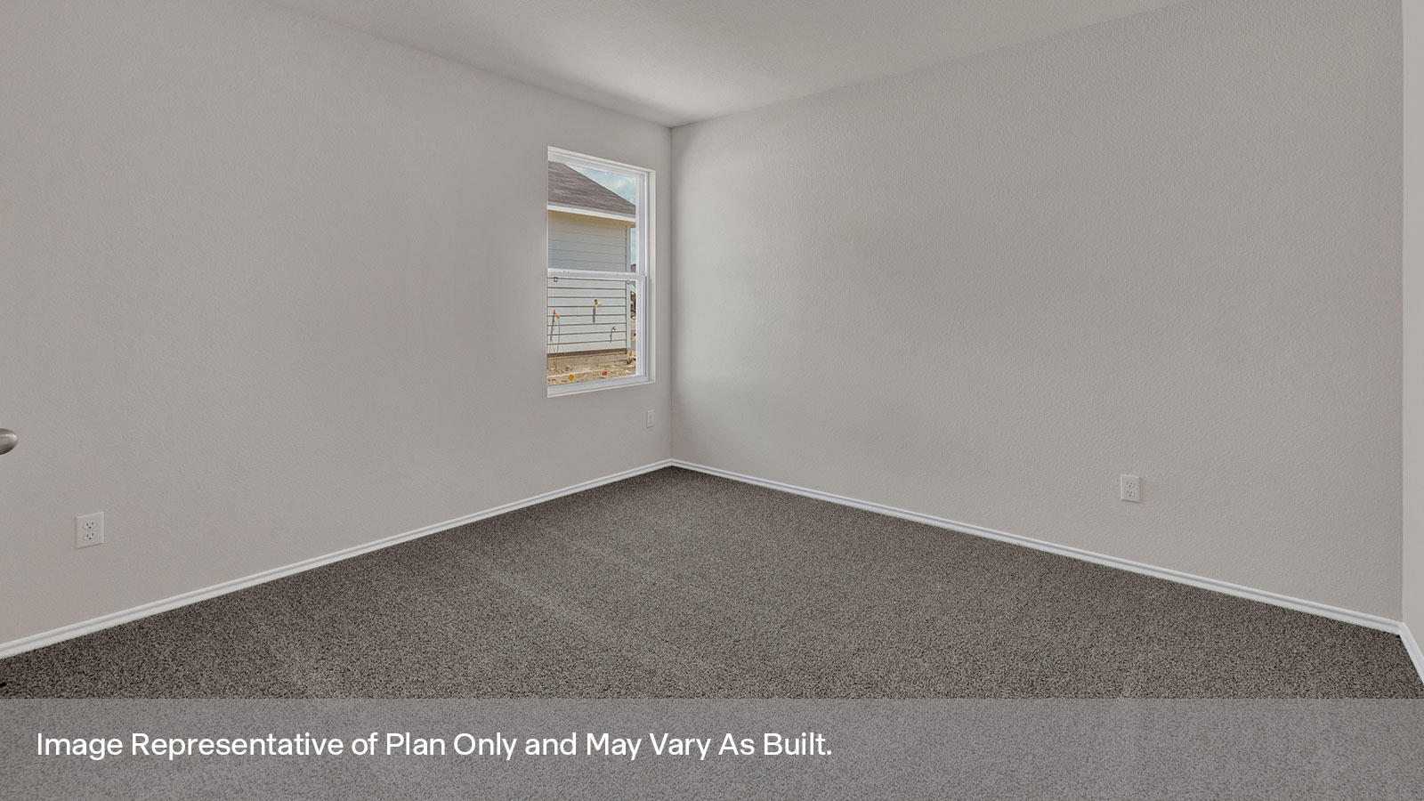 Bedroom with carpeting and one windows.