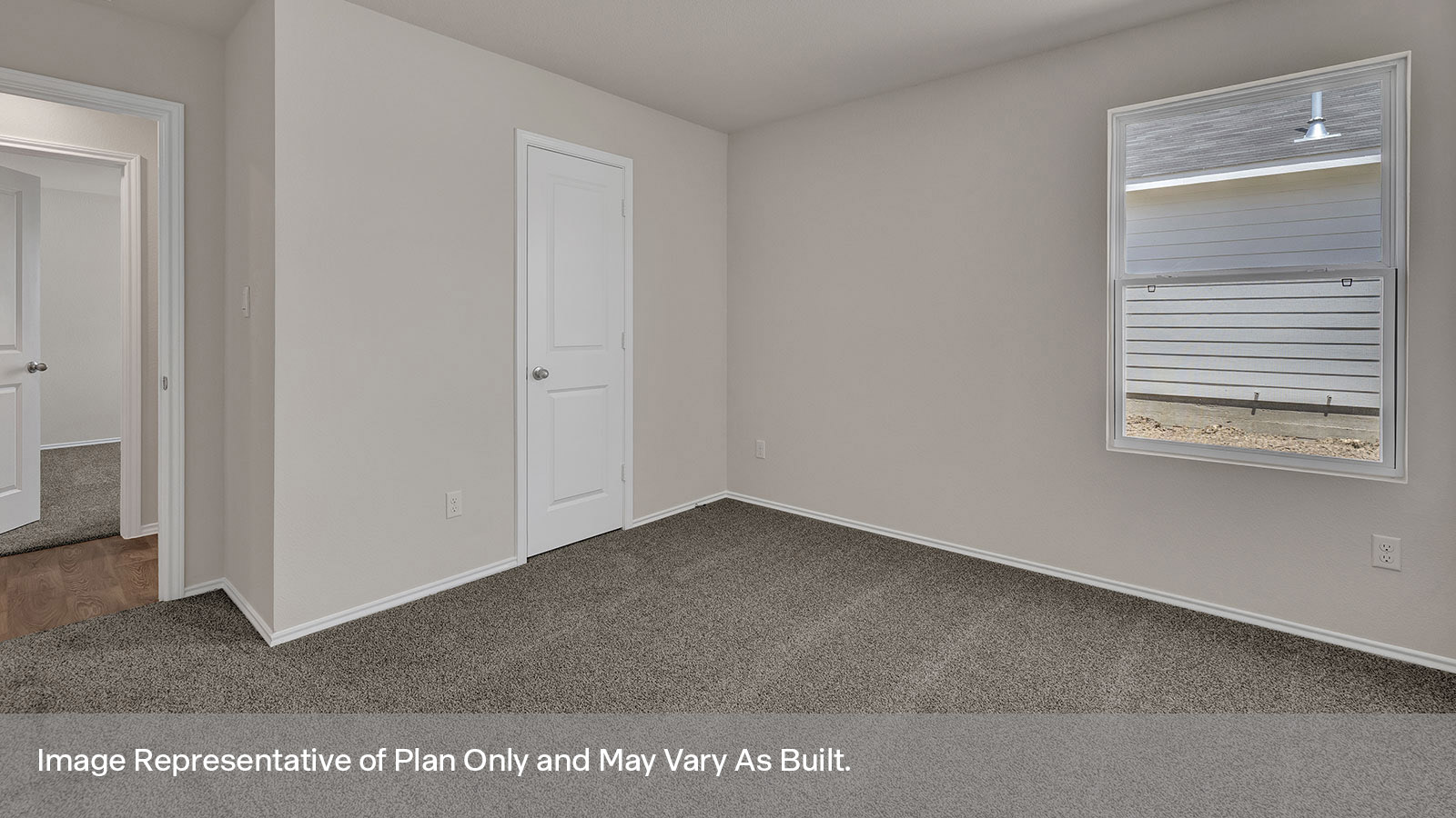 Bedroom with carpeting and one windows.