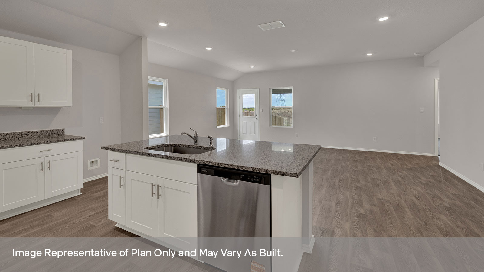 Kitchen island and large sink looking into the living room.