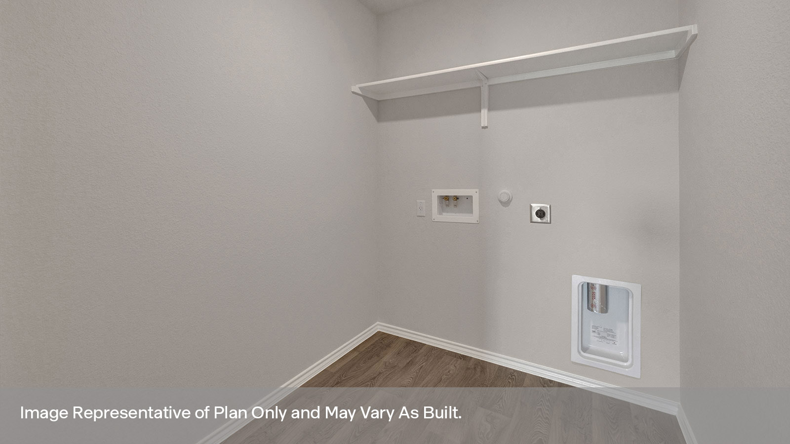 Laundry room with a wood shelf and washer/dryer connections.