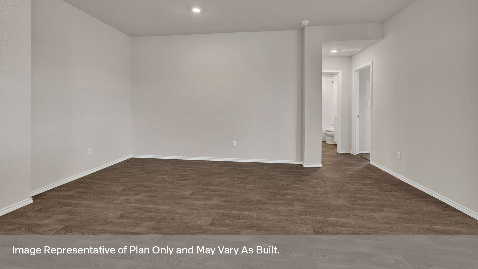 Front bedroom with carpeting and two windows.