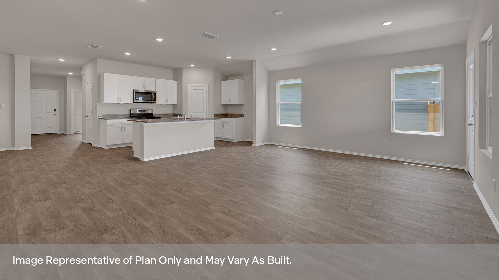 Living room opening to the kitchen and dining room.