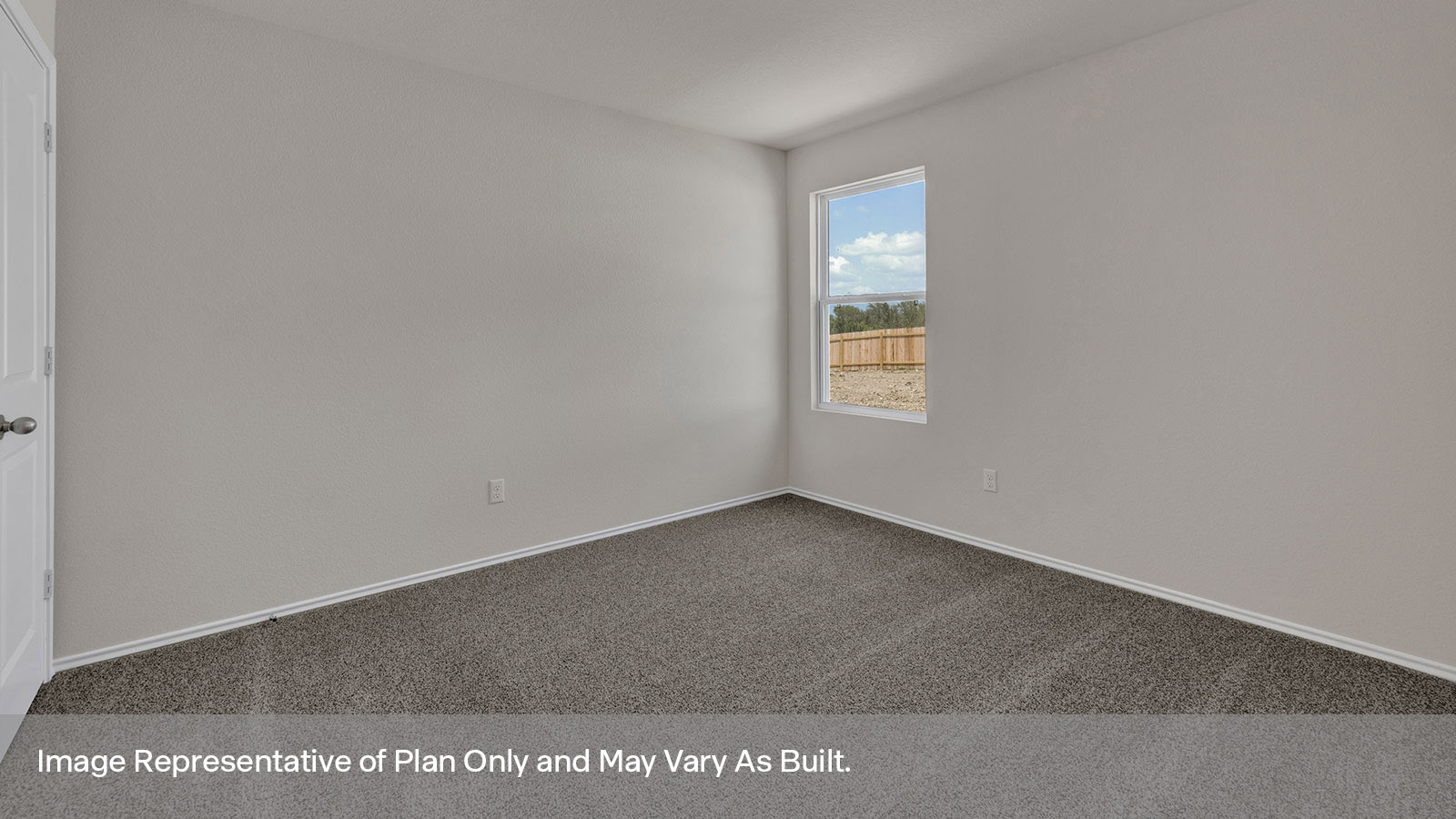 Bedroom with carpeting and one windows.