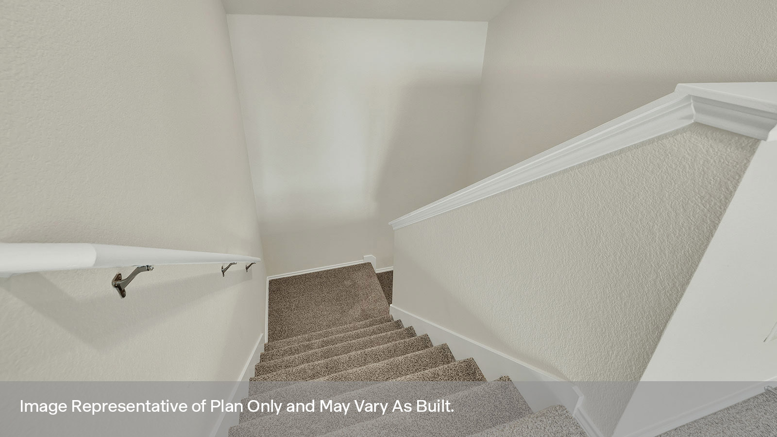 2nd story loft with carpeting and staircase.