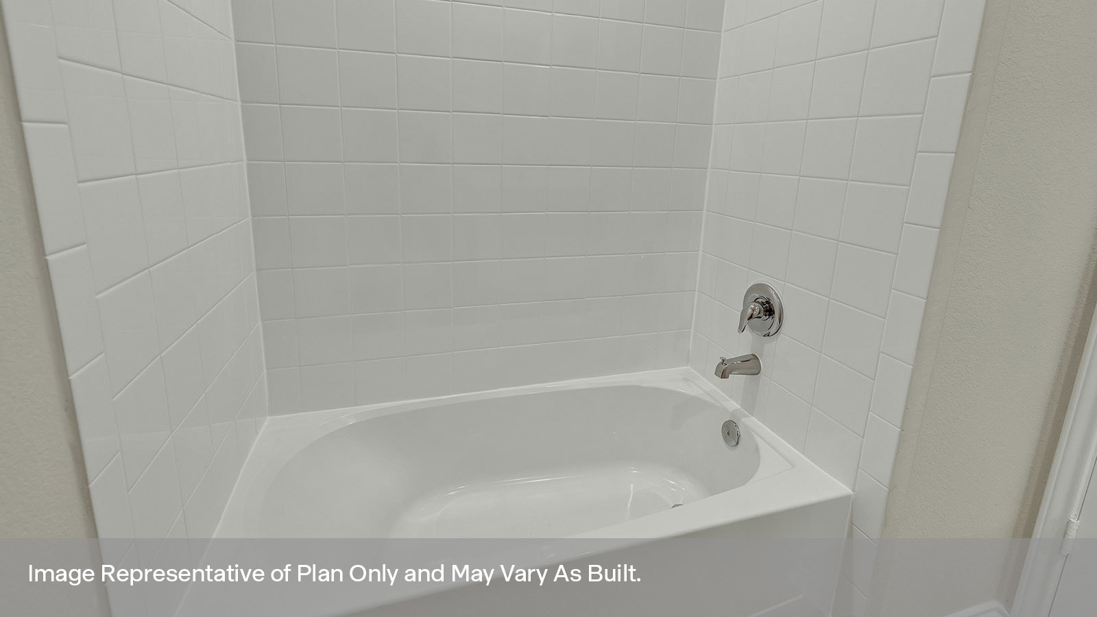 Bathroom with single sink vanity and toilet.