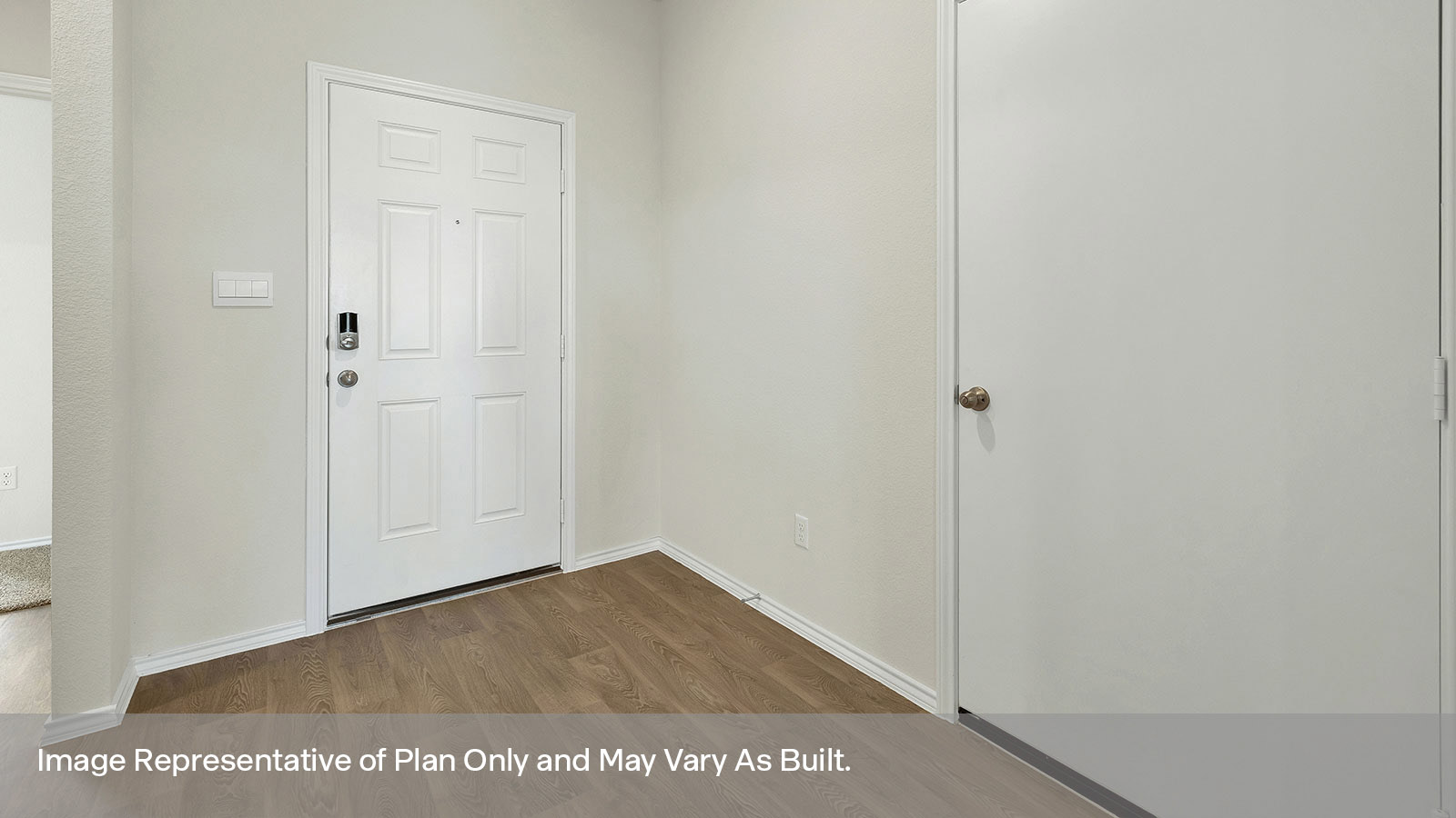 Entryway hallway entry with front door.