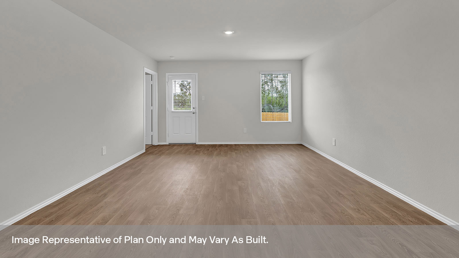 Living room with two windows and door to the back yard