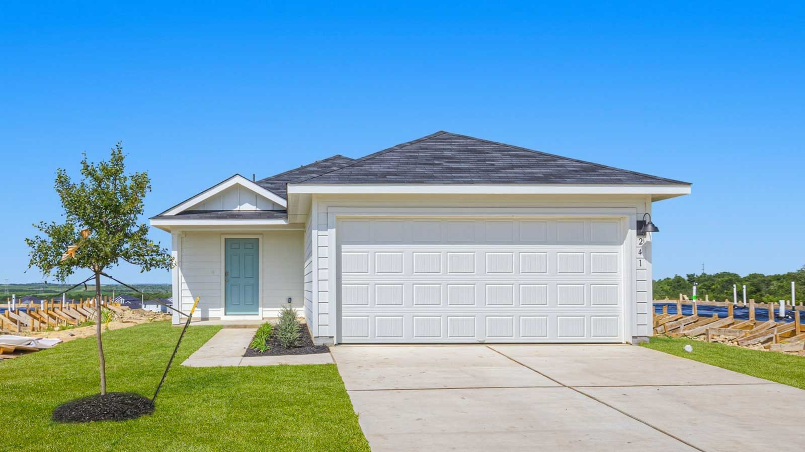 Single-story with farmhouse exteriors.