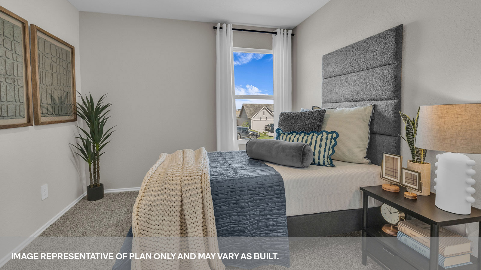 Main bedroom with carpeting and one window.