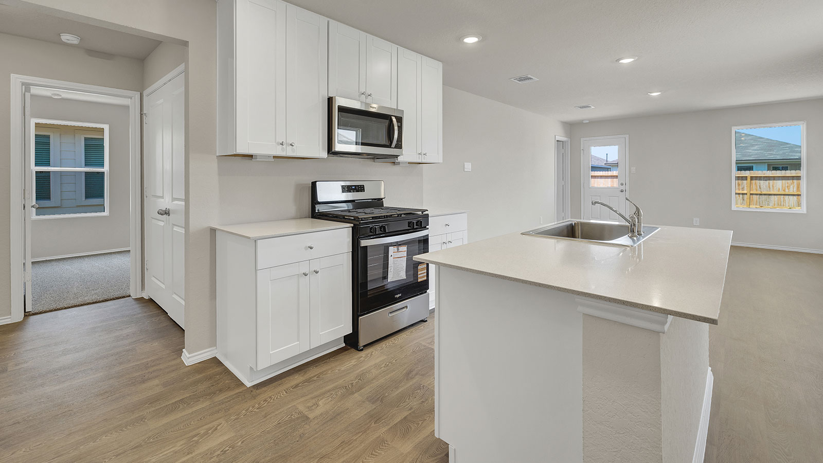 Kitchen with stainless steel appliances.