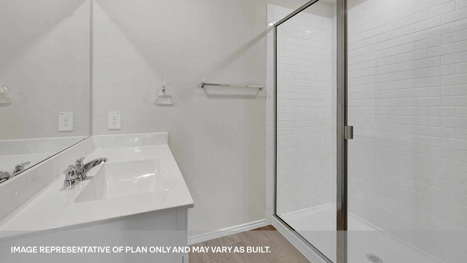 Main bathroom with single sink vanity and closet entry.
