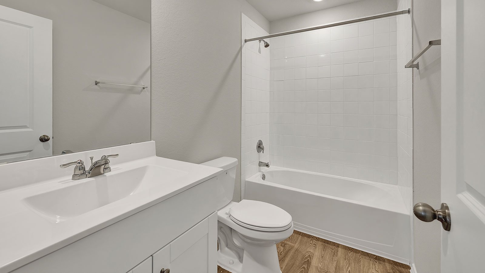 Bath 2 with a vanity, toilet and shower tub combo