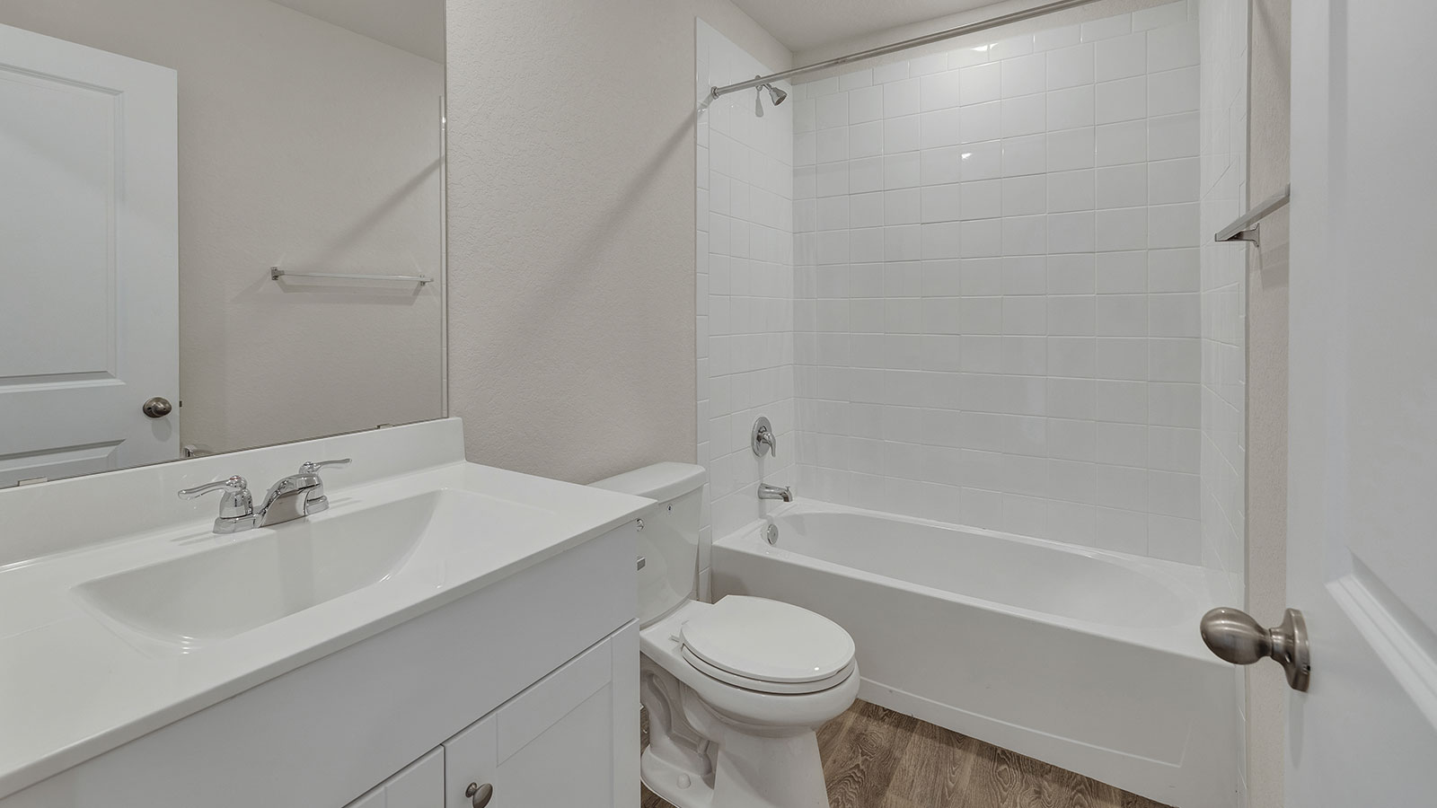 Bath 2 with a vanity, toilet and shower tub combo