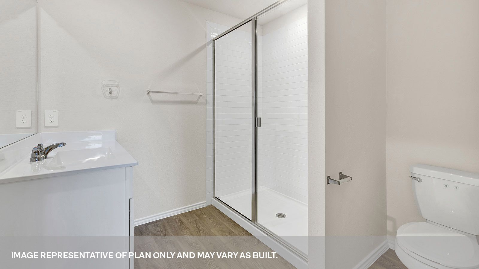Main bathroom with single sink vanity and closet entry.