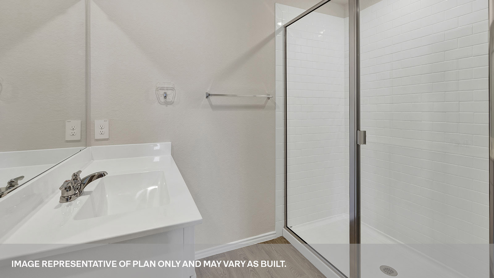 Main bathroom with single sink vanity and closet entry.