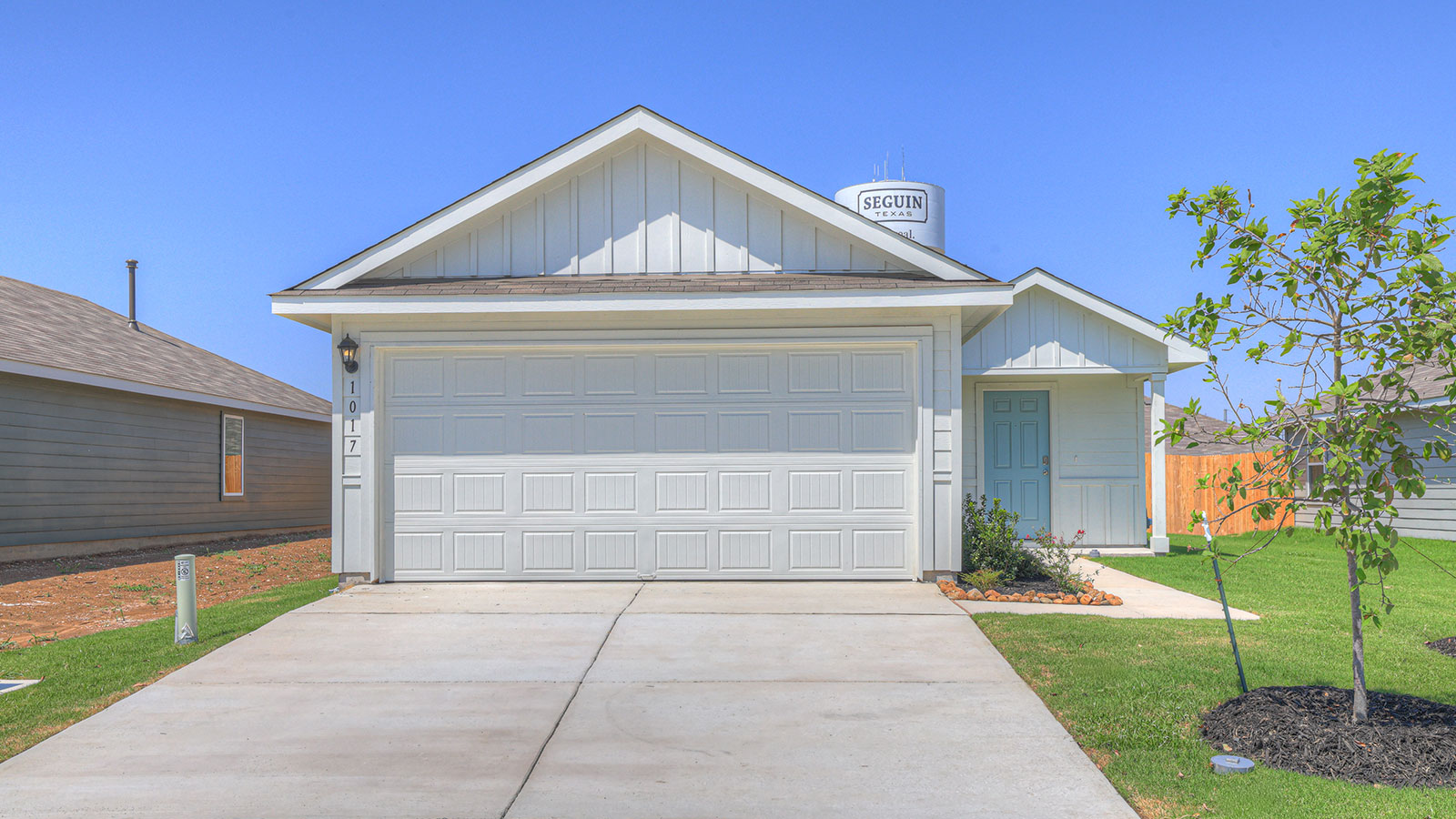 Single-story with farmhouse exteriors.