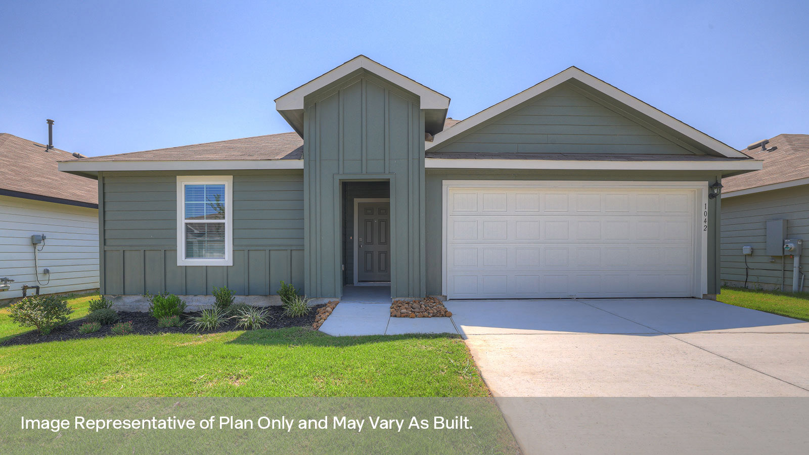 Single-story farmhouse exteriors with 2 car garage door and windows.