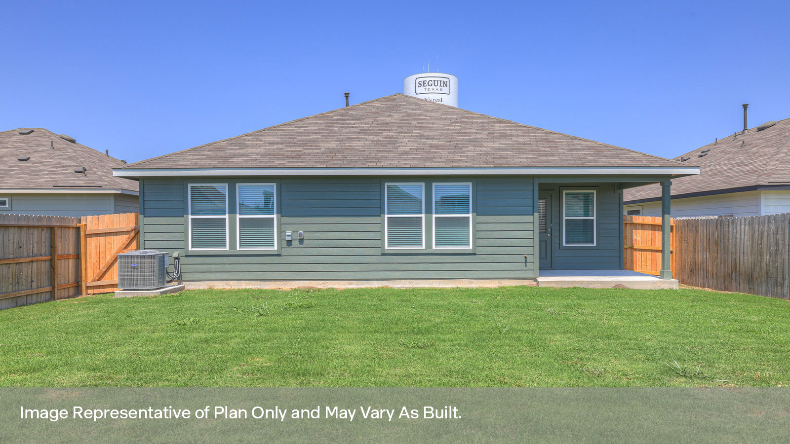 Covered patio with fully sodded backyard.