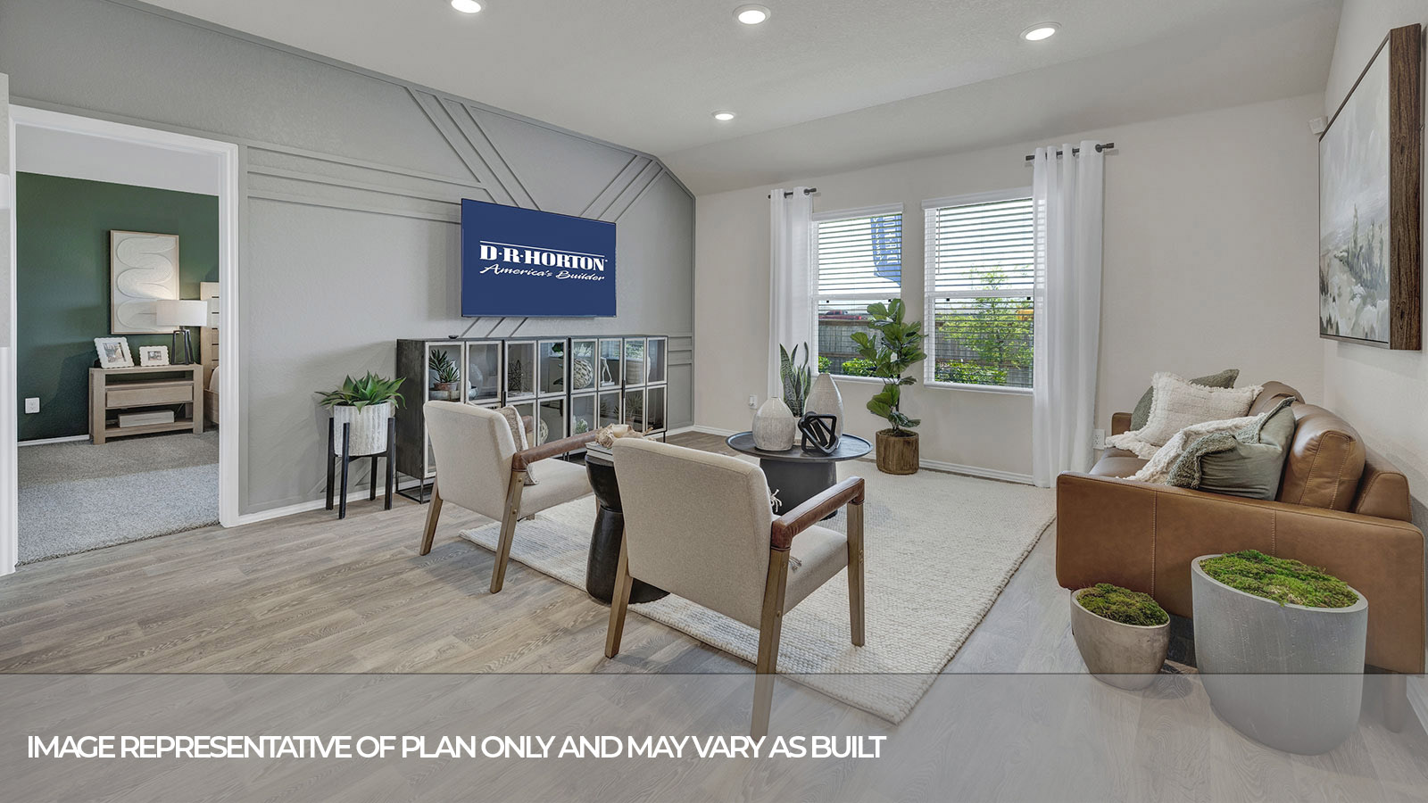 Living room with vinyl flooring and two windows.