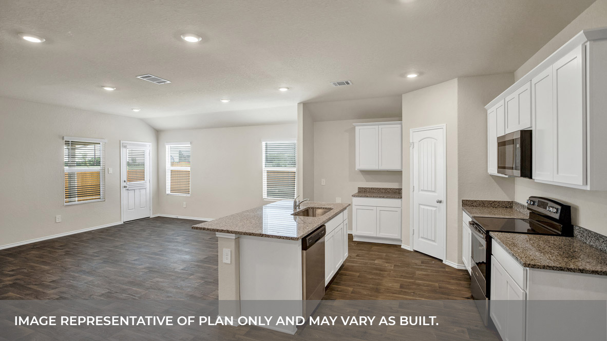Kitchen opening to the living room.