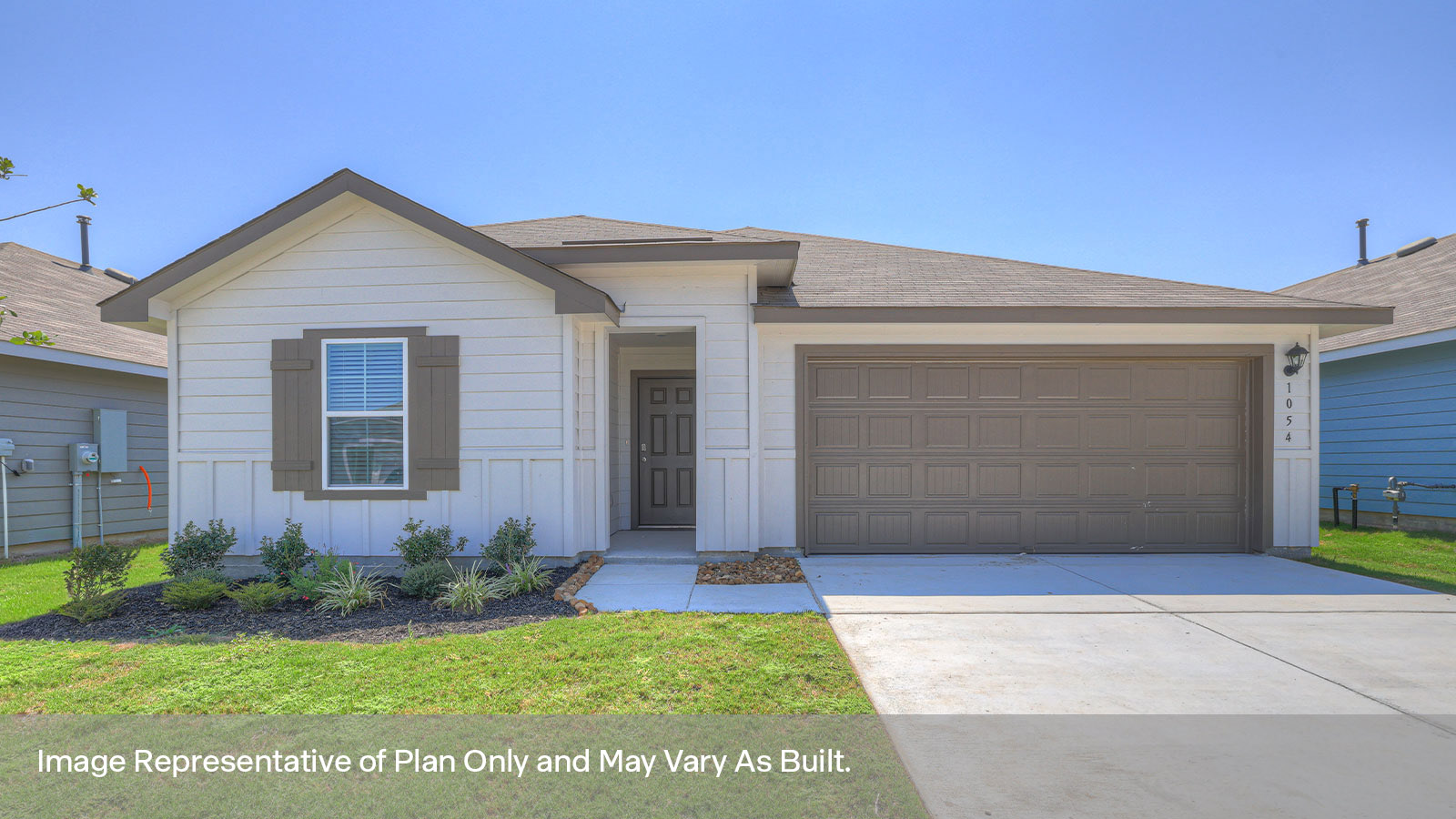 Single-story farmhouse exteriors with 2 car garage and 2 windows.