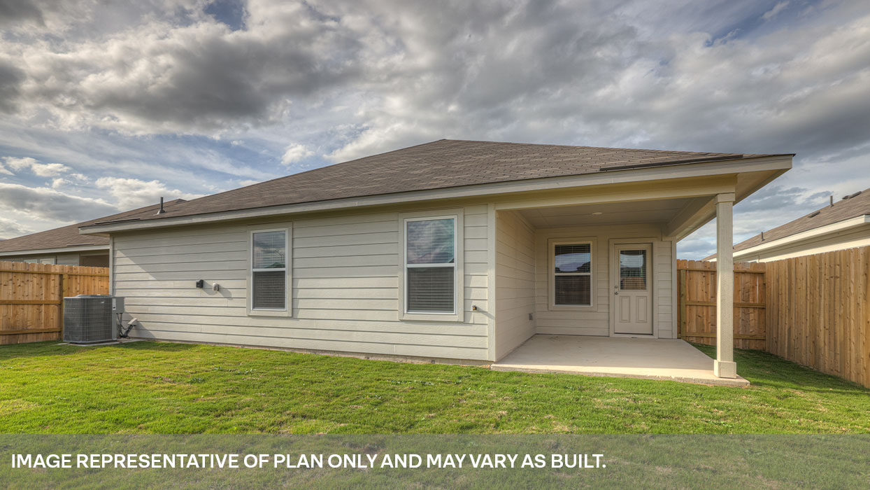 Covered patio with fully sodded backyard and privacy fence.