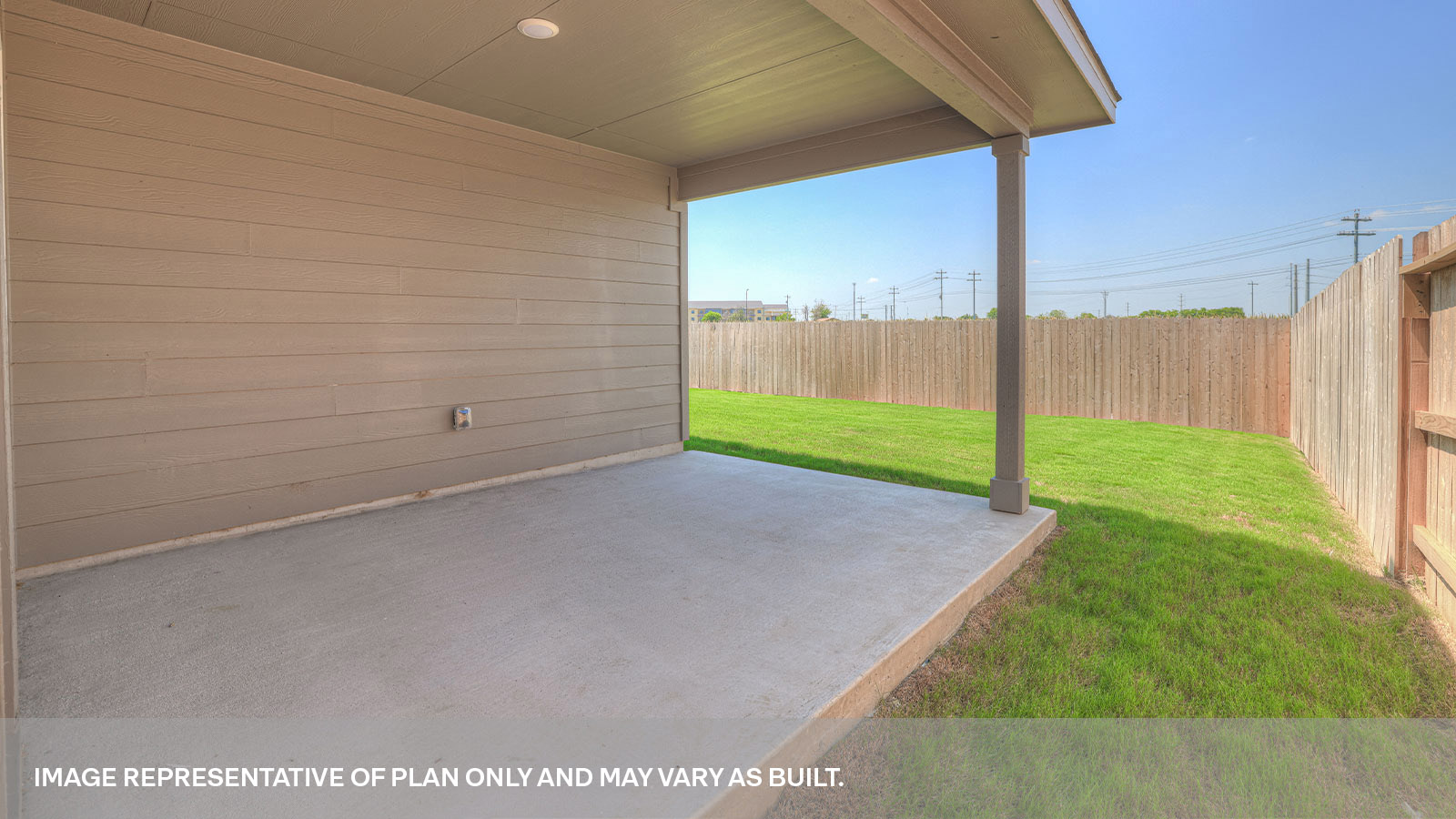 Covered patio overlooking the backyard.