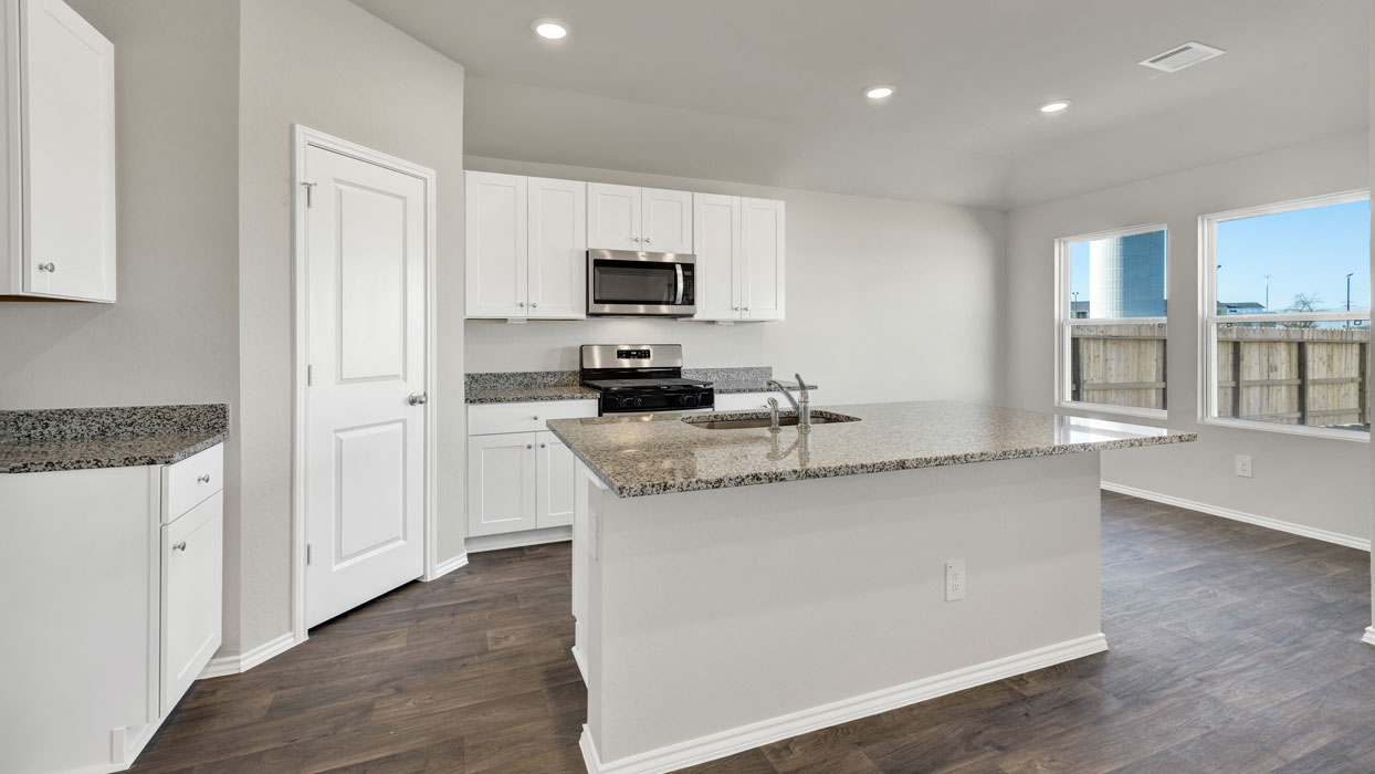 Navarro Fields Zavalla  Floorplan Kitchen Island Countertop and Dining